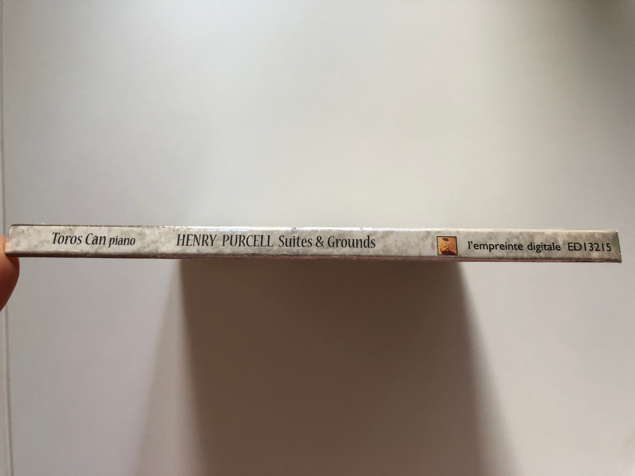 https://cdn10.bigcommerce.com/s-62bdpkt7pb/products/0/images/222623/Henry_Purcell_-_Suites_Grounds_Toros_Can_piano_Nocturne_Audio_CD_2005_EDI3215_3__14680.1650301927.1280.1280.JPG?c=2&_gl=1*1b1snxj*_ga*MjA2NTIxMjE2MC4xNTkwNTEyNTMy*_ga_WS2VZYPC6G*MTY1MDI5Mjc5MS4zNjAuMS4xNjUwMzAxNjUzLjQ.