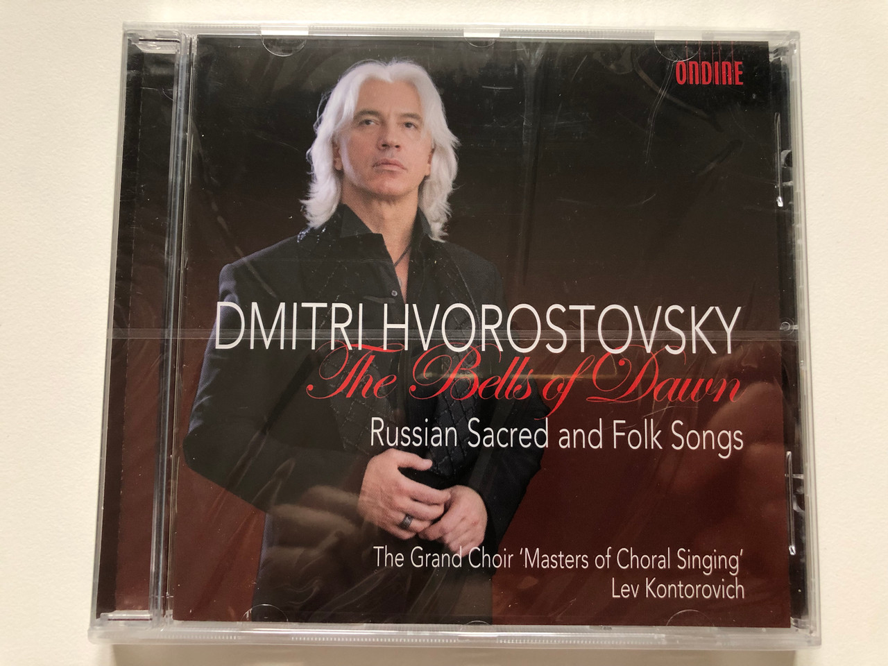 https://cdn10.bigcommerce.com/s-62bdpkt7pb/products/0/images/223178/Dmitri_Hvorostovsky_-_The_Bells_Of_Dawn_-_Russian_Sacred_And_Folk_Songs_The_Grand_Choir_Masters_of_Choral_Singing_Lev_Kontorovich_Ondine_Audio_CD_2014_ODE_1238-2_1__59319.1650470629.1280.1280.JPG?c=2&_gl=1*6lodee*_ga*MjA2NTIxMjE2MC4xNTkwNTEyNTMy*_ga_WS2VZYPC6G*MTY1MDQ2MjU1MC4zNjIuMS4xNjUwNDcwMjkyLjU1