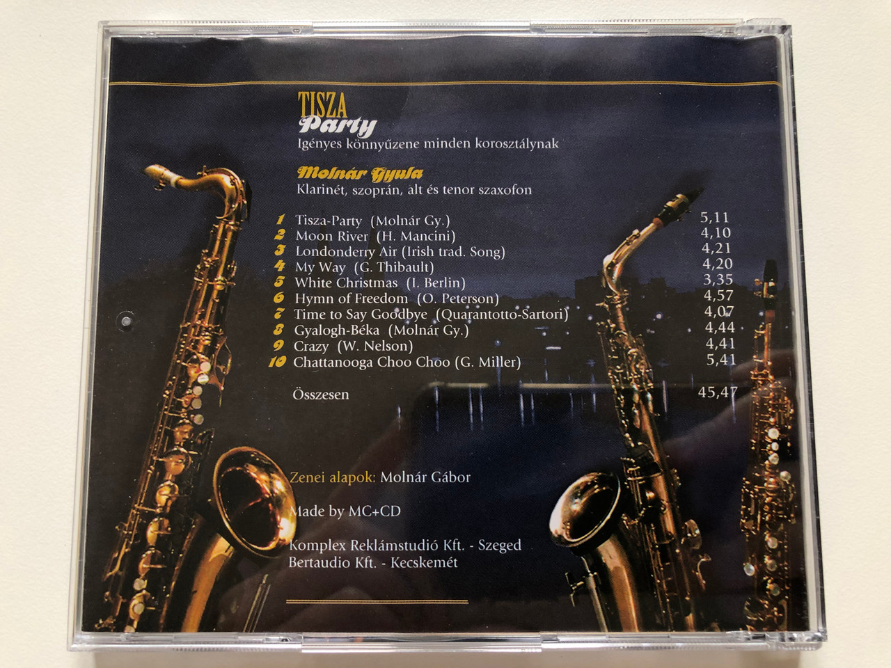 https://cdn10.bigcommerce.com/s-62bdpkt7pb/products/0/images/223557/Tisza_Party_-_Molnar_Gyula_-_klarineton_es_szaxofonon_jatszik_Audio_CD_MGY111_5__21577.1650552060.1280.1280.JPG?c=2&_gl=1*13cjy38*_ga*MjA2NTIxMjE2MC4xNTkwNTEyNTMy*_ga_WS2VZYPC6G*MTY1MDU0ODUxNi4zNjQuMS4xNjUwNTUxNzAyLjEz