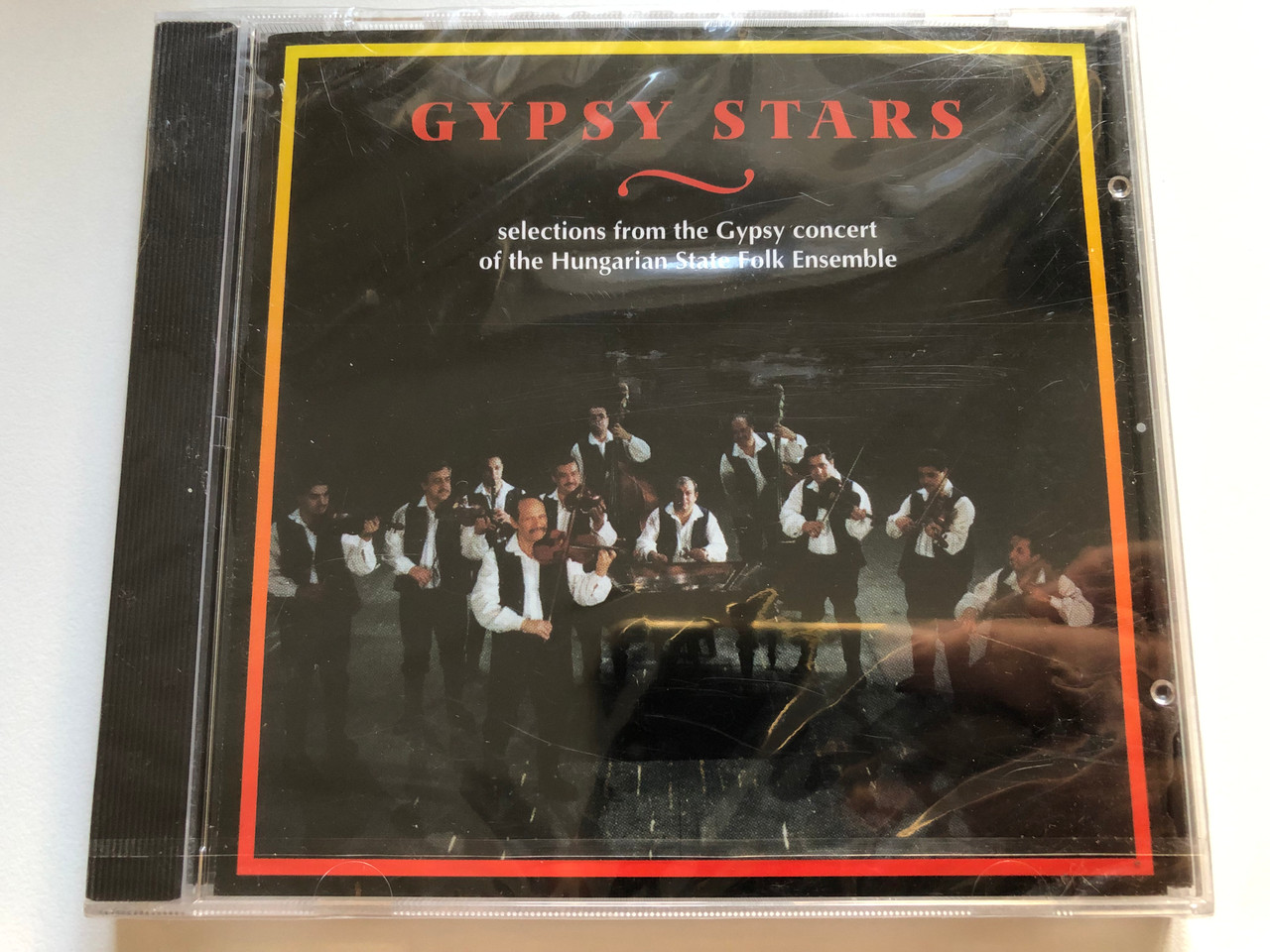 https://cdn10.bigcommerce.com/s-62bdpkt7pb/products/0/images/223900/Gypsy_Stars_-_Selections_from_the_Gypsy_concert_of_the_Hungarian_State_Folk_Ensemble_Sony_DACD_Audio_CD_CDAN_02_1__09367.1650620288.1280.1280.JPG?c=2&_gl=1*1n1rver*_ga*MjA2NTIxMjE2MC4xNTkwNTEyNTMy*_ga_WS2VZYPC6G*MTY1MDYxODUyNi4zNjUuMS4xNjUwNjIwMDI2LjQw