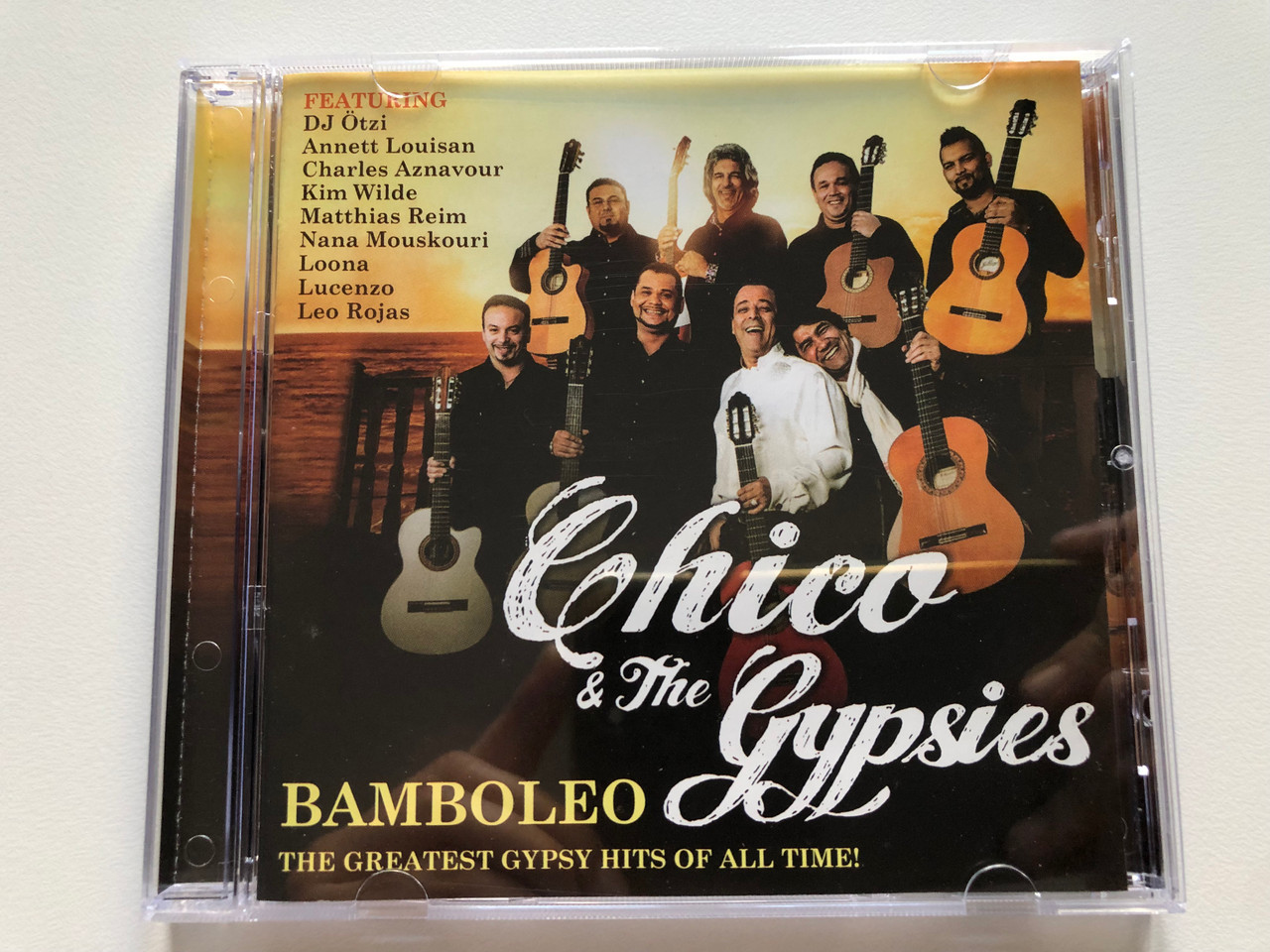 https://cdn10.bigcommerce.com/s-62bdpkt7pb/products/0/images/224586/Chico_The_Gypsies_Bamboleo_-_The_Greatest_Gypsy_Hits_Of_All_Time_Featuring_DJ_Otzi_Annett_Louisan_Charles_Aznavour_Kim_Wilde_Matthias_Reim_Nana_Mouskouri_Loona_Lucenzo_Akropolis_1__31424.1650878026.1280.1280.JPG?c=2&_gl=1*1bz9krk*_ga*MjA2NTIxMjE2MC4xNTkwNTEyNTMy*_ga_WS2VZYPC6G*MTY1MDg2Nzk5Ni4zNjcuMS4xNjUwODc4MDA2LjYw