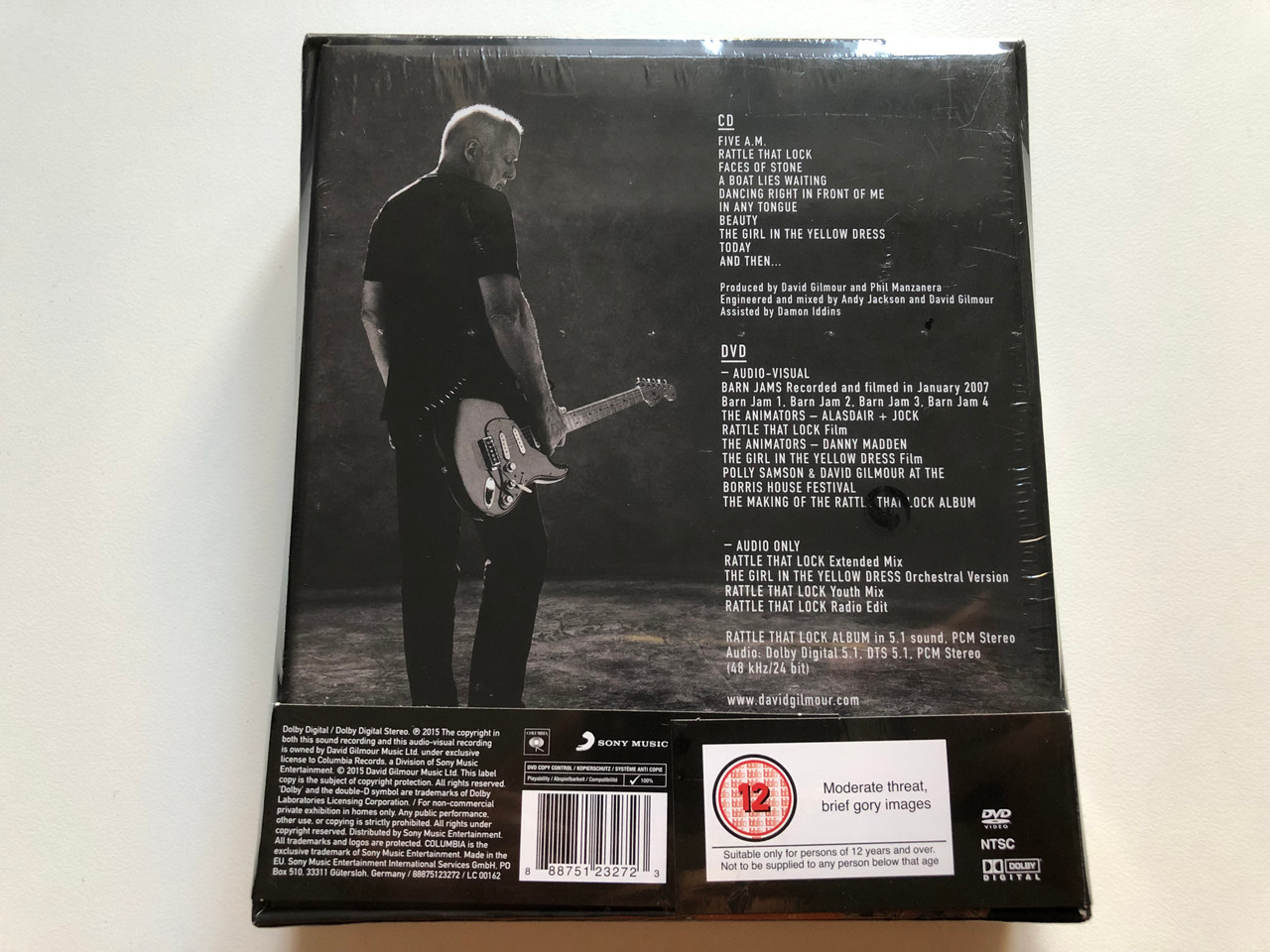 https://cdn10.bigcommerce.com/s-62bdpkt7pb/products/0/images/224762/David_Gilmour_Rattle_That_Lock_Deluxe_2-Disc_Set_-_CD_DVD_Includes_Album_in_5.1_mixes_Stereo_4_video_tracks_4_audio_tracks_2_promo_films_4_documentaries_Columbia_Audio_CD_DVD___87062.1650958899.1280.1280.JPG?c=2&_gl=1*90rn1l*_ga*MjA2NTIxMjE2MC4xNTkwNTEyNTMy*_ga_WS2VZYPC6G*MTY1MDk1MTExOC4zNjkuMS4xNjUwOTU4NTY2LjEw