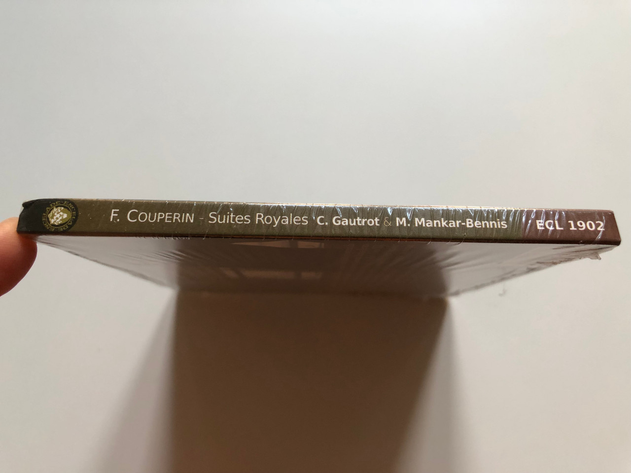 https://cdn10.bigcommerce.com/s-62bdpkt7pb/products/0/images/224811/Franois_Couperin_-_Suites_Royales_-_Claire_Gautrot_Marouan_Mankar-Bennis_LEncelade_Audio_CD_2020_ECL_1902_3__26419.1650965762.1280.1280.JPG?c=2&_gl=1*kxsjal*_ga*MjA2NTIxMjE2MC4xNTkwNTEyNTMy*_ga_WS2VZYPC6G*MTY1MDk1MTExOC4zNjkuMS4xNjUwOTY1NTE2LjUz