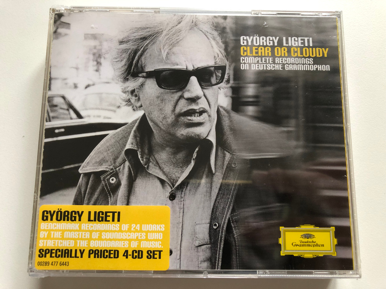 https://cdn10.bigcommerce.com/s-62bdpkt7pb/products/0/images/225426/Gyrgy_Ligeti_Clear_Or_Cloudy_-_Complete_Recordings_On_Deutsche_Grammophon_Deutsche_Grammophon_4x_Audio_CD_2006_Stereo_00289_477_6443_1__01577.1651136900.1280.1280.JPG?c=2&_gl=1*1xyq62c*_ga*MjA2NTIxMjE2MC4xNTkwNTEyNTMy*_ga_WS2VZYPC6G*MTY1MTEyMzM2NC4zNzIuMS4xNjUxMTM2NjYzLjM2