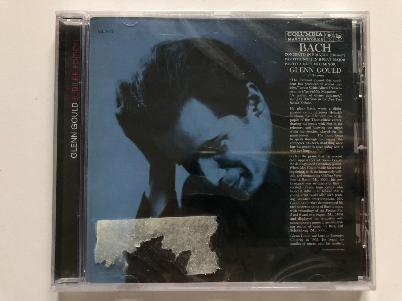 https://cdn10.bigcommerce.com/s-62bdpkt7pb/products/0/images/226297/Glenn_Gould_at_the_piano_-_Bach_Concerto_In_F_Major_Italian_Partita_No._1_In_B-Flat_Major_Partita_No._2_In_C_Minor_Glenn_Gould_Jubilee_Edition_Sony_Classical_Audio_CD_2007_8869_1__42009.1651475719.1280.1280.JPG?c=2&_gl=1*f9ecxo*_ga*MjA2NTIxMjE2MC4xNTkwNTEyNTMy*_ga_WS2VZYPC6G*MTY1MTQ3MjA0OS4zNzYuMS4xNjUxNDc1NTI2LjU1