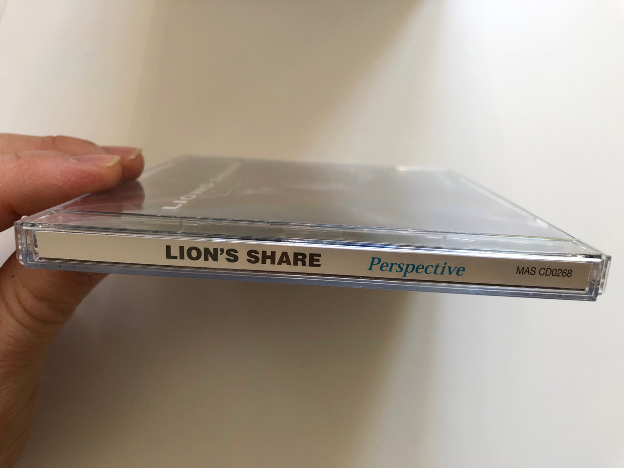 https://cdn10.bigcommerce.com/s-62bdpkt7pb/products/0/images/226370/Lions_Share_Perspective_Massacre_Records_2x_Audio_CD_2000_MAS_CD0268_3__50453.1651560041.1280.1280.JPG?c=2&_gl=1*185btww*_ga*MjA2NTIxMjE2MC4xNTkwNTEyNTMy*_ga_WS2VZYPC6G*MTY1MTU1ODAzOC4zODAuMS4xNjUxNTYwMTAzLjYw