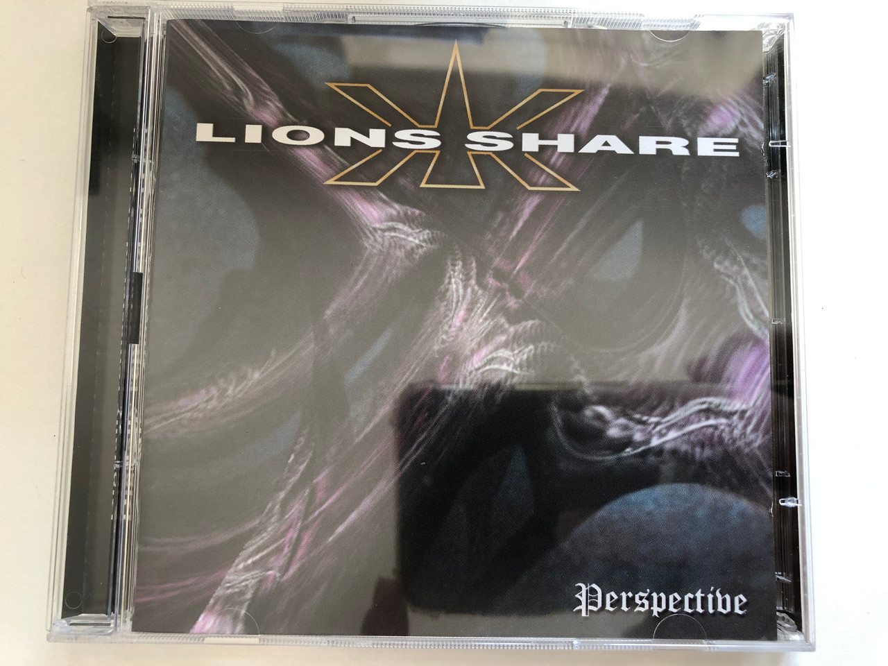 https://cdn10.bigcommerce.com/s-62bdpkt7pb/products/0/images/226372/Lions_Share_Perspective_Massacre_Records_2x_Audio_CD_2000_MAS_CD0268_1__16146.1651560042.1280.1280.JPG?c=2&_gl=1*185btww*_ga*MjA2NTIxMjE2MC4xNTkwNTEyNTMy*_ga_WS2VZYPC6G*MTY1MTU1ODAzOC4zODAuMS4xNjUxNTYwMTAzLjYw