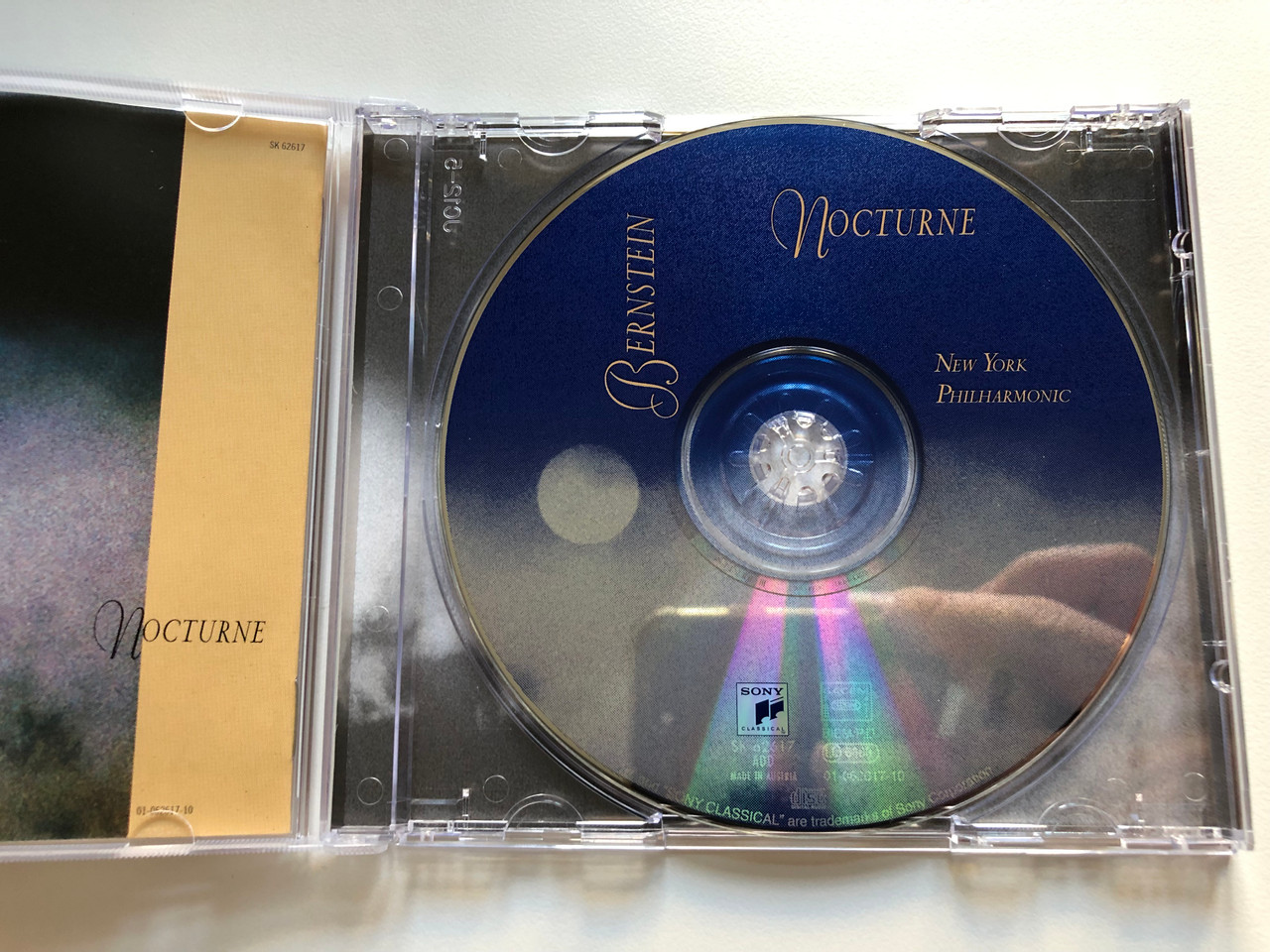 https://cdn10.bigcommerce.com/s-62bdpkt7pb/products/0/images/226418/Bernstein_-_Nocturne_New_York_Philharmonic_Sony_Classical_Audio_CD_1996_SK_62617_2__00916.1651569508.1280.1280.JPG?c=2&_gl=1*u3tc40*_ga*MjA2NTIxMjE2MC4xNTkwNTEyNTMy*_ga_WS2VZYPC6G*MTY1MTU1ODAzOC4zODAuMS4xNjUxNTY5NDAwLjYw