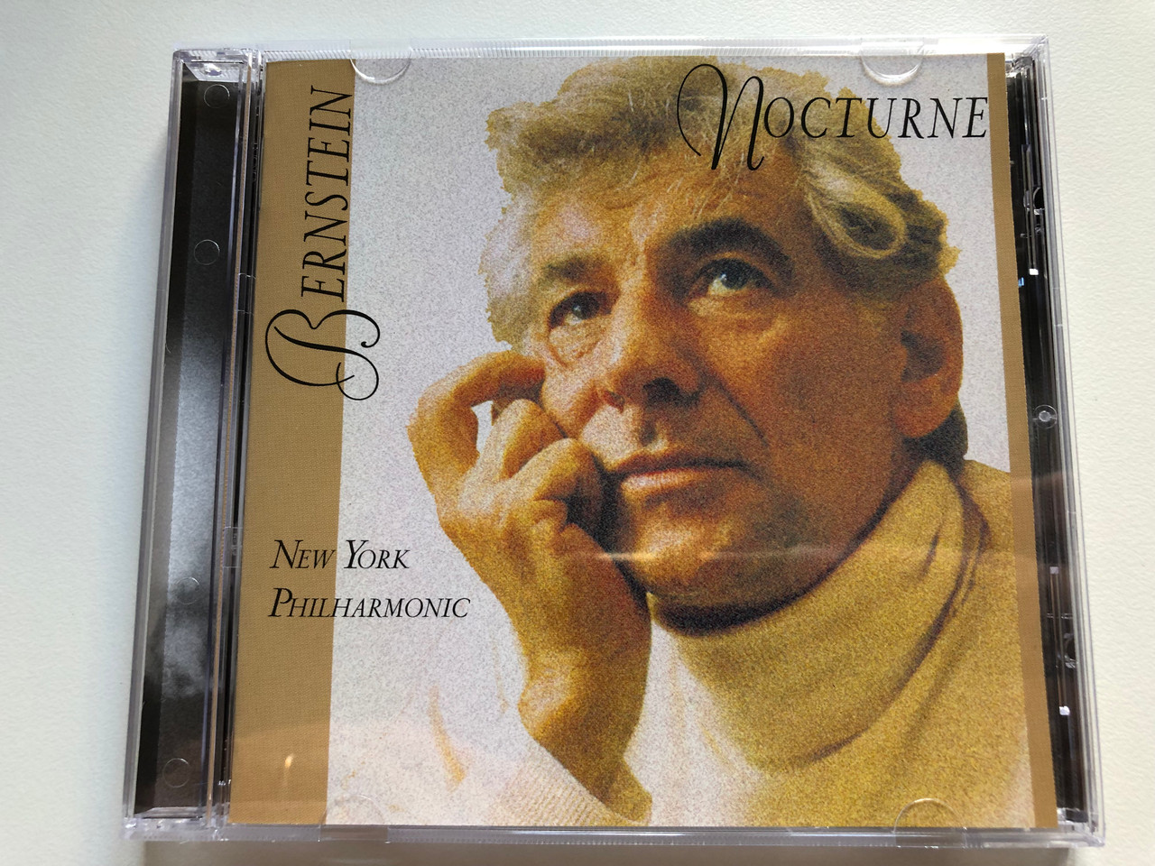 https://cdn10.bigcommerce.com/s-62bdpkt7pb/products/0/images/226419/Bernstein_-_Nocturne_New_York_Philharmonic_Sony_Classical_Audio_CD_1996_SK_62617_1__03927.1651569509.1280.1280.JPG?c=2&_gl=1*u3tc40*_ga*MjA2NTIxMjE2MC4xNTkwNTEyNTMy*_ga_WS2VZYPC6G*MTY1MTU1ODAzOC4zODAuMS4xNjUxNTY5NDAwLjYw