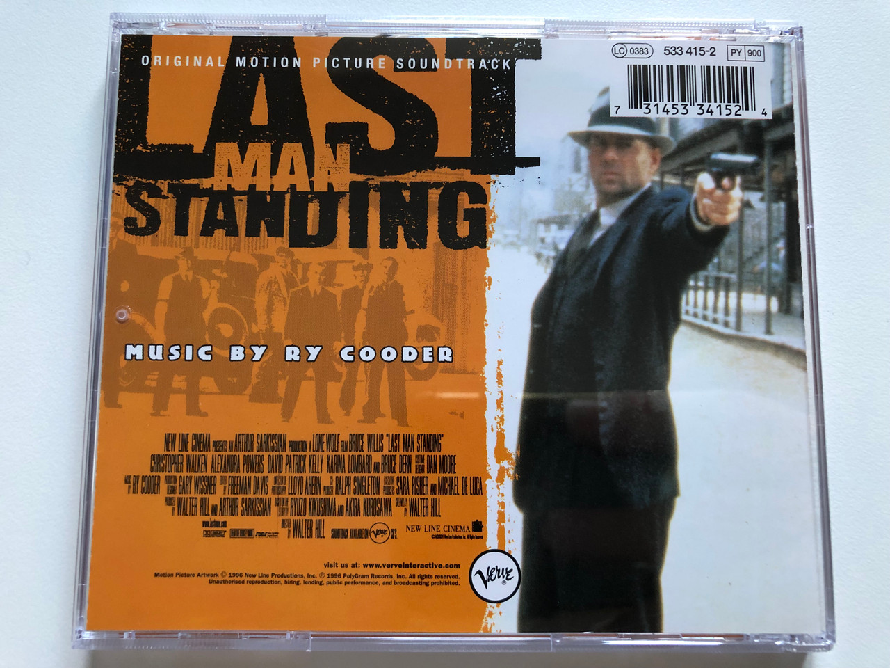 https://cdn10.bigcommerce.com/s-62bdpkt7pb/products/0/images/226431/Bruce_Willis_-_Last_Man_Standing_-_Music_By_Ry_Cooder_Original_Motion_Picture_Soundtrack_There_Are_Two_Sides_To_Every_War._And_John_Smith_Is_On_Both_Of_Them._Verve_Records_Audio_CD_1996_4__22828.1651570916.1280.1280.JPG?c=2&_gl=1*1ryffsj*_ga*MjA2NTIxMjE2MC4xNTkwNTEyNTMy*_ga_WS2VZYPC6G*MTY1MTU1ODAzOC4zODAuMS4xNjUxNTcwNzA0LjM3