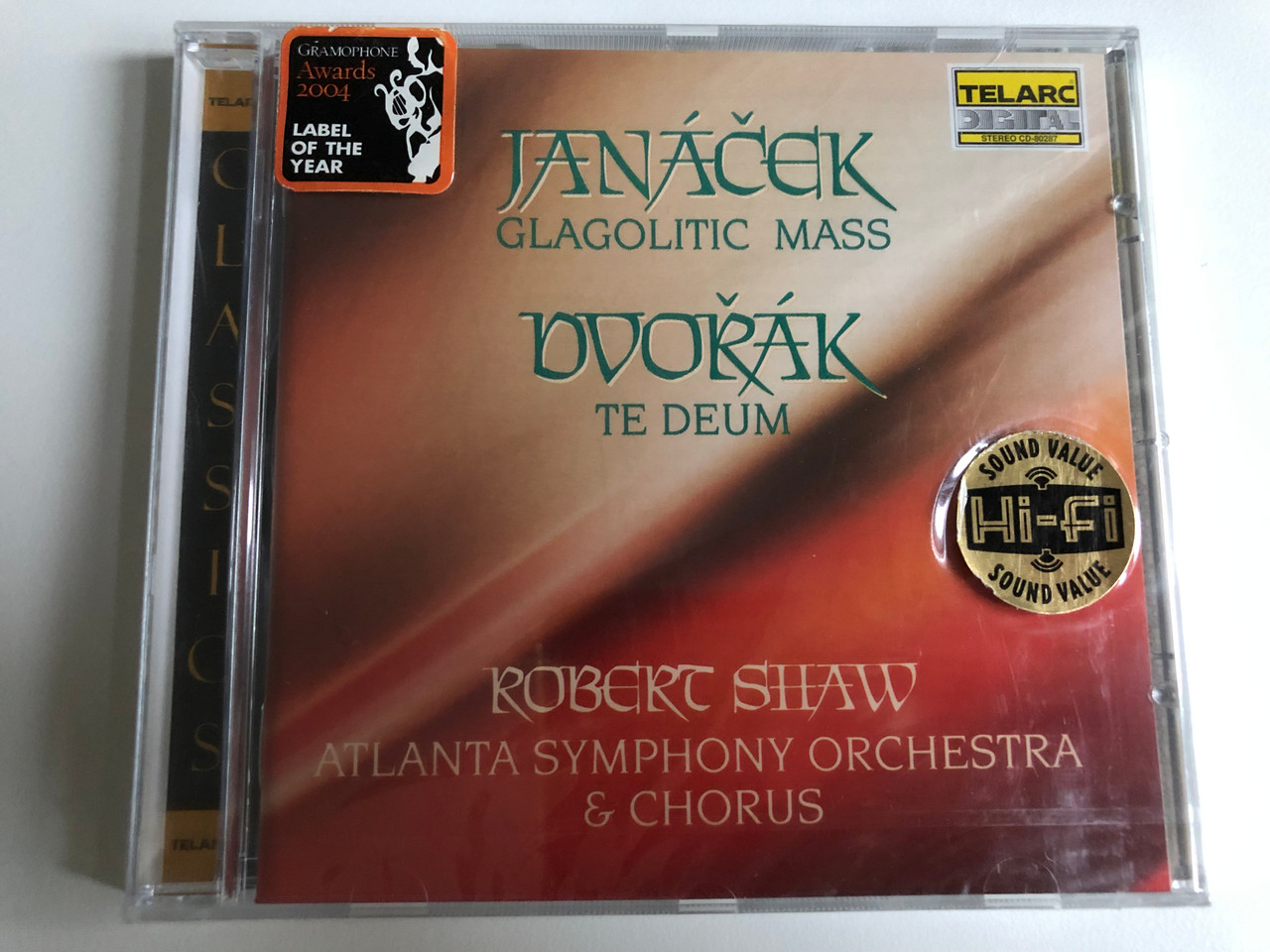 https://cdn10.bigcommerce.com/s-62bdpkt7pb/products/0/images/226562/Janek_-_Glagolitic_Mass_Dvok_-_Te_Deum_Robert_Shaw_Atlanta_Symphony_Orchestra_Chorus_Telarc_Audio_CD_1991_CD-80287_1__85955.1651665235.1280.1280.JPG?c=2&_gl=1*1rhbsz5*_ga*MjA2NTIxMjE2MC4xNTkwNTEyNTMy*_ga_WS2VZYPC6G*MTY1MTY2NDM1Mi4zODMuMS4xNjUxNjY1MDk4LjU1