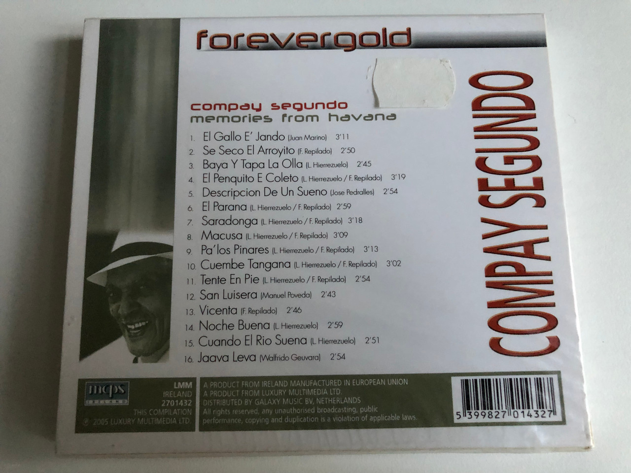 https://cdn10.bigcommerce.com/s-62bdpkt7pb/products/0/images/226606/Compay_Segundo_-_Memories_From_Havana_El_Gallo_E_Jando_Se_Seco_El_Arroyito_El_Parana_Forevergold_Luxury_Multimedia_Audio_CD_2005_2701432_2__63350.1651670546.1280.1280.JPG?c=2&_gl=1*1khj0x2*_ga*MjA2NTIxMjE2MC4xNTkwNTEyNTMy*_ga_WS2VZYPC6G*MTY1MTY2NDM1Mi4zODMuMS4xNjUxNjcwMTI1LjM.