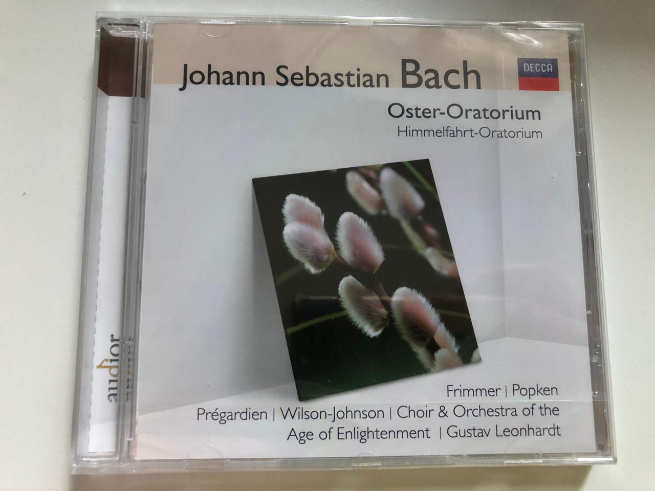 https://cdn10.bigcommerce.com/s-62bdpkt7pb/products/0/images/226998/Johann_Sebastian_Bach_-_Oster-Oratorium_Himmelfahrt-Oratorium_Frimmer_Popken_Pregardien_Wilson-Johnson_Choir_Orchestra_of_the_Age_of_Enlightenment_Gustav_Leonardt_Decca_Audio_CD_2009_1__86839.1652157735.1280.1280.JPG?c=2&_gl=1*1mmhw8e*_ga*MjA2NTIxMjE2MC4xNTkwNTEyNTMy*_ga_WS2VZYPC6G*MTY1MjE1NzAzOS4zODguMS4xNjUyMTU3NDQ0LjM2