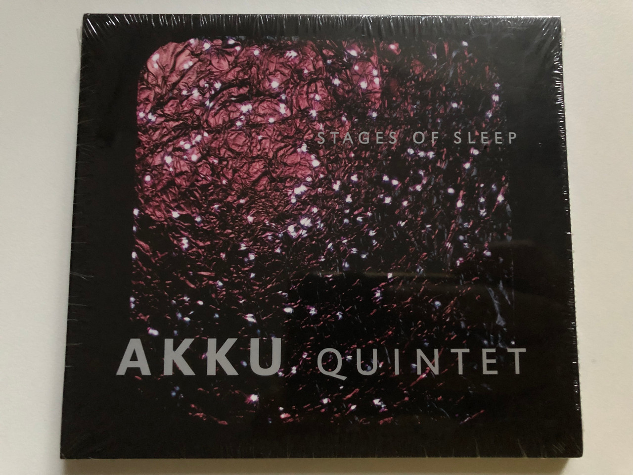 https://cdn10.bigcommerce.com/s-62bdpkt7pb/products/0/images/227012/Akku_Quintet_Stages_Of_Sleep_Morpheus_Records_Audio_CD_2013_MORPH001_1__54247.1652161279.1280.1280.JPG?c=2&_gl=1*g56hww*_ga*MjA2NTIxMjE2MC4xNTkwNTEyNTMy*_ga_WS2VZYPC6G*MTY1MjE1NzAzOS4zODguMS4xNjUyMTYxMTgyLjUx