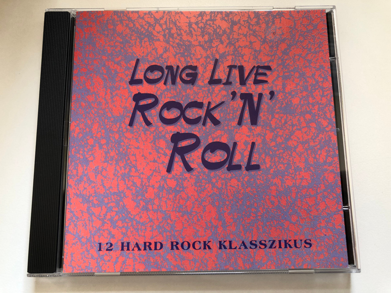 https://cdn10.bigcommerce.com/s-62bdpkt7pb/products/0/images/227252/Long_Live_Rock_n_Roll_-_12_Hard_Rock_Klasszikus_PolyGram_Hungary_Audio_CD_1994_525_160-2_1__75715.1652251018.1280.1280.JPG?c=2&_gl=1*opl5ex*_ga*MjA2NTIxMjE2MC4xNTkwNTEyNTMy*_ga_WS2VZYPC6G*MTY1MjI0NzQ2MS4zOTEuMS4xNjUyMjUwOTI3LjM2