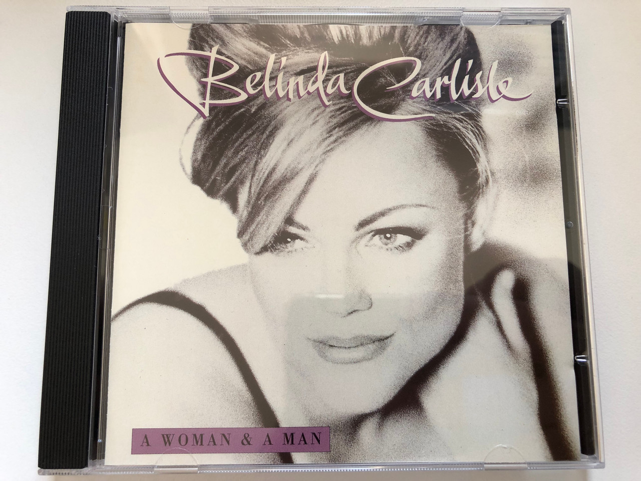 https://cdn10.bigcommerce.com/s-62bdpkt7pb/products/0/images/227255/Belinda_Carlisle_A_Woman_A_Man_Chrysalis_Audio_CD_1996_724385354526_1__28940.1652251414.1280.1280.JPG?c=2&_gl=1*mxbnub*_ga*MjA2NTIxMjE2MC4xNTkwNTEyNTMy*_ga_WS2VZYPC6G*MTY1MjI0NzQ2MS4zOTEuMS4xNjUyMjUxMjU3LjM4