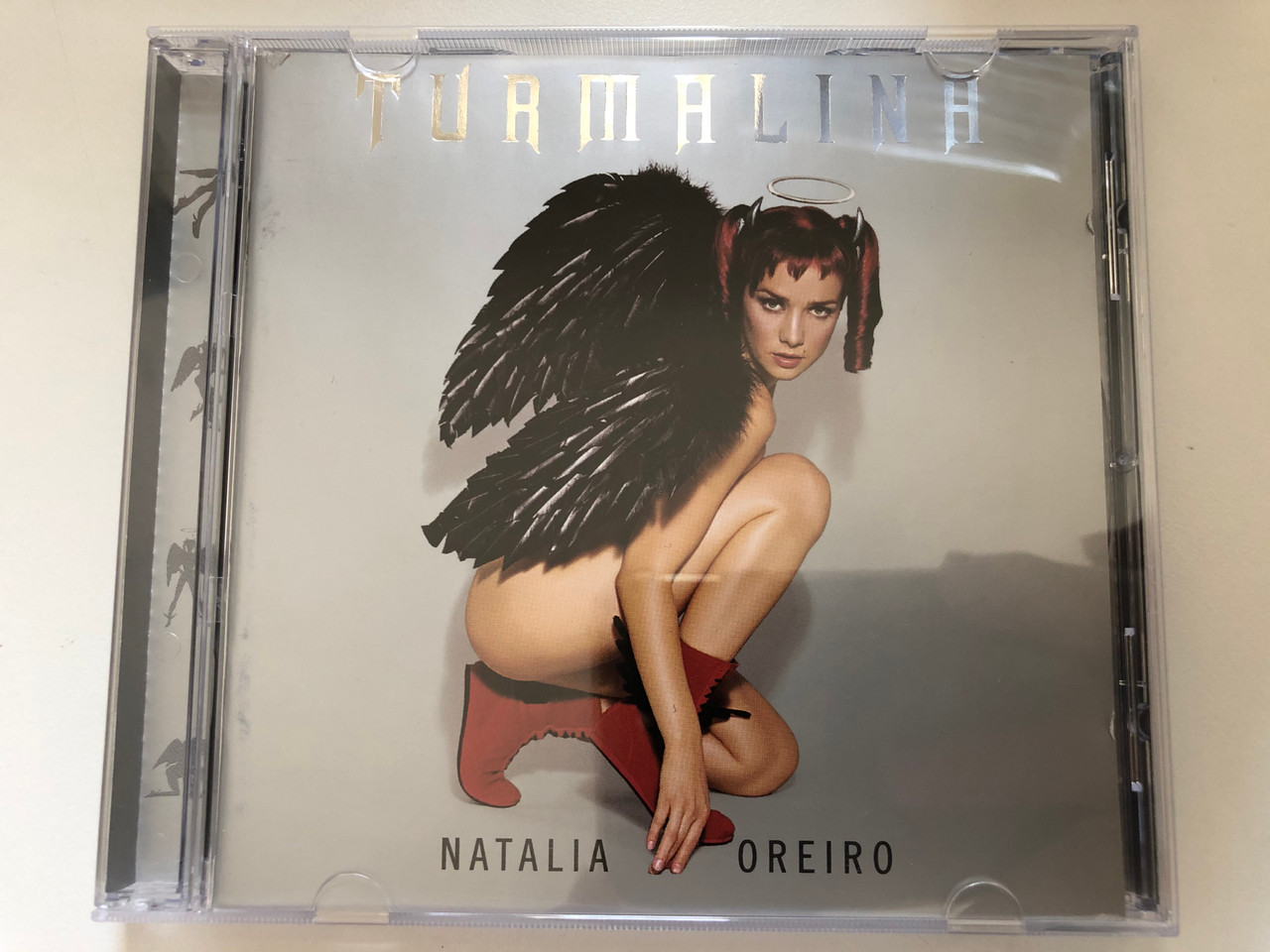 https://cdn10.bigcommerce.com/s-62bdpkt7pb/products/0/images/227286/Natalia_Oreiro_Turmalina_BMG_Argentina_Audio_CD_2002_74321_94937_2_1__38003.1652254608.1280.1280.JPG?c=2&_gl=1*1p5xdtk*_ga*MjA2NTIxMjE2MC4xNTkwNTEyNTMy*_ga_WS2VZYPC6G*MTY1MjI0NzQ2MS4zOTEuMS4xNjUyMjU0NTI2LjQx