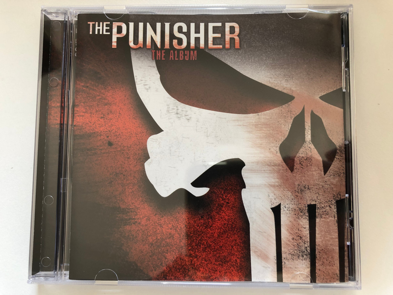 https://cdn10.bigcommerce.com/s-62bdpkt7pb/products/0/images/227386/The_Punisher_The_Album_Wind-Up_Audio_CD_2004_515410_2_1__62074.1652361922.1280.1280.JPG?c=2&_gl=1*kk582z*_ga*MjA2NTIxMjE2MC4xNTkwNTEyNTMy*_ga_WS2VZYPC6G*MTY1MjM2MTcxNy4zOTMuMS4xNjUyMzYxNzM3LjQw