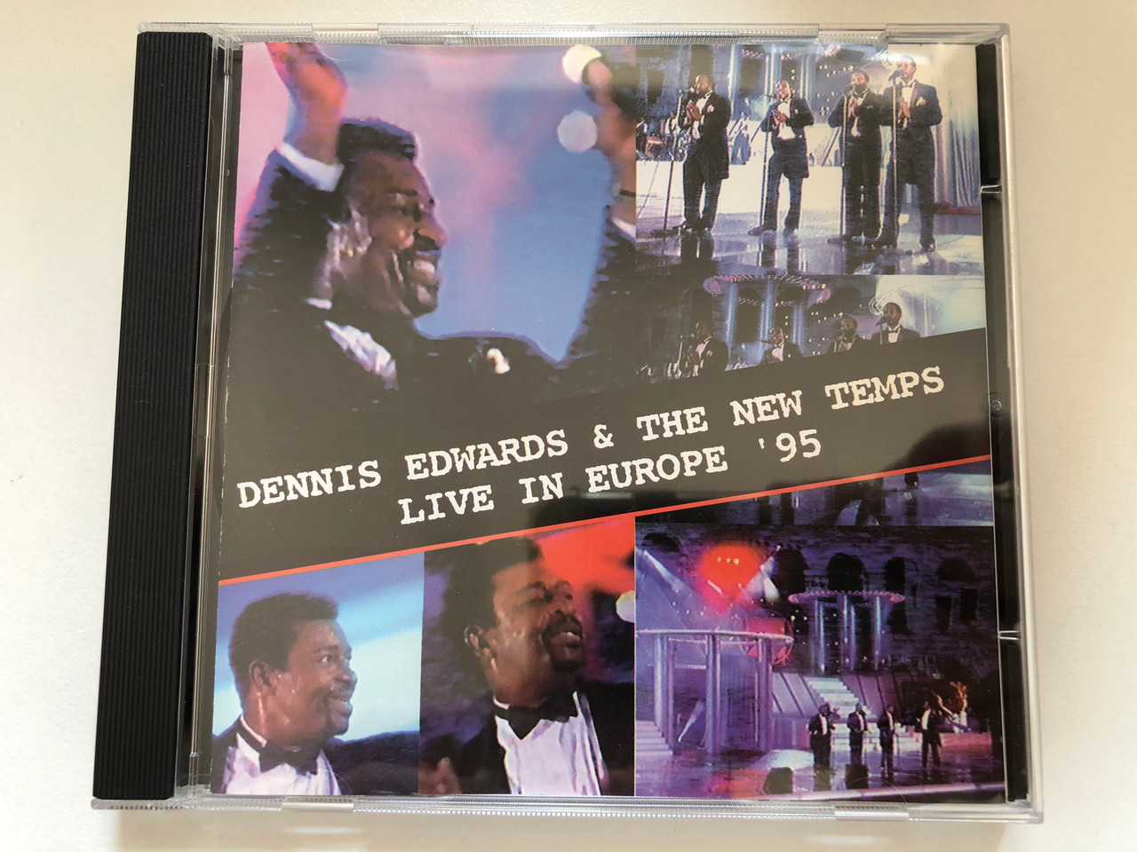 https://cdn10.bigcommerce.com/s-62bdpkt7pb/products/0/images/227389/Dennis_Edwards_The_New_Temps_Live_In_Europe_95_Storm_Records_Audio_CD_1995_STR_200_372_1__07354.1652362330.1280.1280.JPG?c=2&_gl=1*134ahy0*_ga*MjA2NTIxMjE2MC4xNTkwNTEyNTMy*_ga_WS2VZYPC6G*MTY1MjM2MTcxNy4zOTMuMS4xNjUyMzYyMTg4LjM4