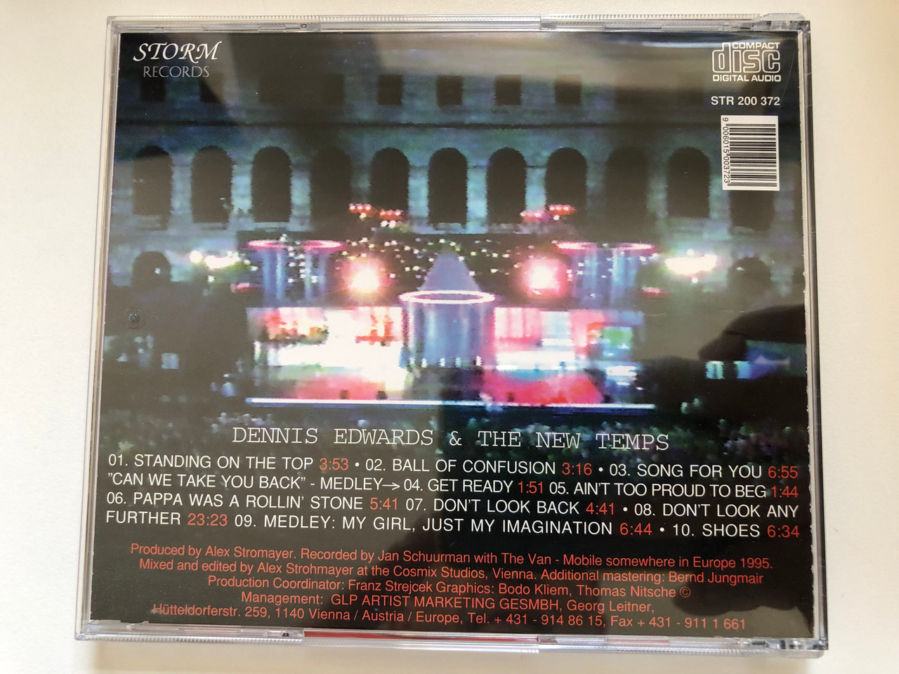 https://cdn10.bigcommerce.com/s-62bdpkt7pb/products/0/images/227391/Dennis_Edwards_The_New_Temps_Live_In_Europe_95_Storm_Records_Audio_CD_1995_STR_200_372_4__34574.1652362333.1280.1280.JPG?c=2&_gl=1*134ahy0*_ga*MjA2NTIxMjE2MC4xNTkwNTEyNTMy*_ga_WS2VZYPC6G*MTY1MjM2MTcxNy4zOTMuMS4xNjUyMzYyMTg4LjM4