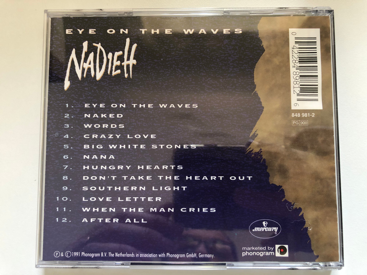 https://cdn10.bigcommerce.com/s-62bdpkt7pb/products/0/images/227482/Nadieh_Eye_On_The_Waves_Mercury_Audio_CD_1991_848_981-2_2__14417.1652375142.1280.1280.JPG?c=2&_gl=1*zrfa92*_ga*MjA2NTIxMjE2MC4xNTkwNTEyNTMy*_ga_WS2VZYPC6G*MTY1MjM2ODMwNy4zOTQuMS4xNjUyMzc1MDcxLjI3
