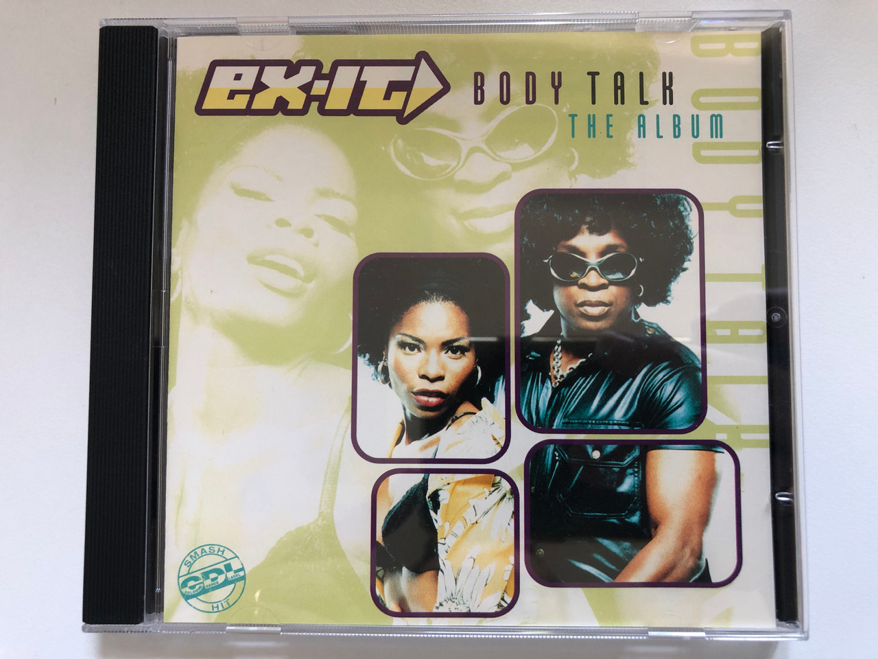 https://cdn10.bigcommerce.com/s-62bdpkt7pb/products/0/images/227488/Ex-It_Body_Talk_The_Album_EMI_Electrola_Audio_CD_1996_724385378423_1__72148.1652375641.1280.1280.JPG?c=2&_gl=1*1jd3da9*_ga*MjA2NTIxMjE2MC4xNTkwNTEyNTMy*_ga_WS2VZYPC6G*MTY1MjM2ODMwNy4zOTQuMS4xNjUyMzc1NTI3LjM4