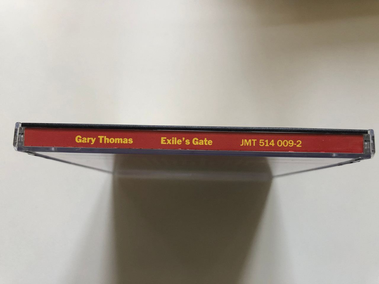 https://cdn10.bigcommerce.com/s-62bdpkt7pb/products/0/images/227540/Gary_Thomas_Exiles_Gate_JMT_Audio_CD_1993_JMT_514_009-2_3__73344.1652432813.1280.1280.JPG?c=2&_gl=1*1sgh3p9*_ga*MjA2NTIxMjE2MC4xNTkwNTEyNTMy*_ga_WS2VZYPC6G*MTY1MjQzMDAwNS4zOTYuMS4xNjUyNDMyNzY2LjYw
