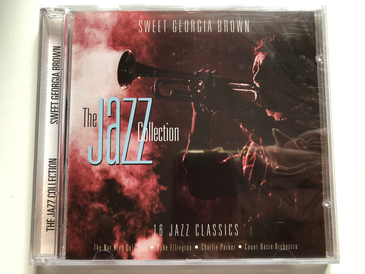 https://cdn10.bigcommerce.com/s-62bdpkt7pb/products/0/images/227872/Sweet_Georgia_Brown_The_Jazz_Collection_16_Jazz_Classics_The_Nat_King_Cole_Trio_Duke_Ellington_Charlie_Parker_Count_Basie_Orchestra_A_Play_Collection_Audio_CD_10169-2_1__02088.1652799320.1280.1280.JPG?c=2&_gl=1*1f57vly*_ga*MjA2NTIxMjE2MC4xNTkwNTEyNTMy*_ga_WS2VZYPC6G*MTY1Mjc5MjYyMC4zOTkuMS4xNjUyNzk5Mjg3LjYw