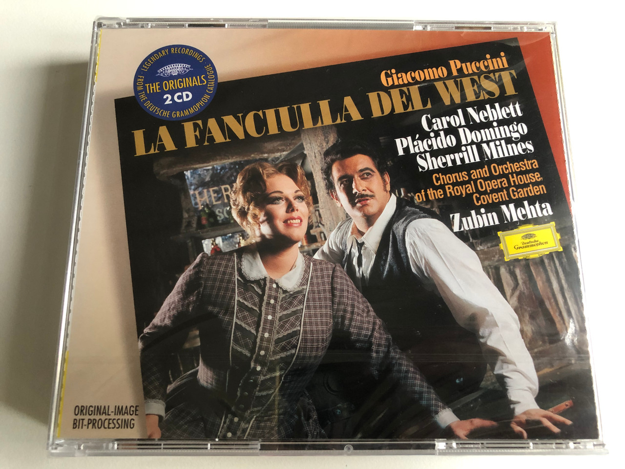 https://cdn10.bigcommerce.com/s-62bdpkt7pb/products/0/images/228020/Giacomo_Puccini_-_La_Fanciulla_Del_West_Carol_Neblett_Placido_Domingo_Sherrill_Milnes_Chorus_And_Orchestra_Of_The_Royal_Opera_House_Covent_Garden_Zubin_Mehta_Deutsche_Grammophon_2x_Audio_1__77279.1652874413.1280.1280.JPG?c=2&_gl=1*18mqn9i*_ga*MjA2NTIxMjE2MC4xNTkwNTEyNTMy*_ga_WS2VZYPC6G*MTY1Mjg3MzY3Ni40MDIuMS4xNjUyODc0Mzg3LjYw