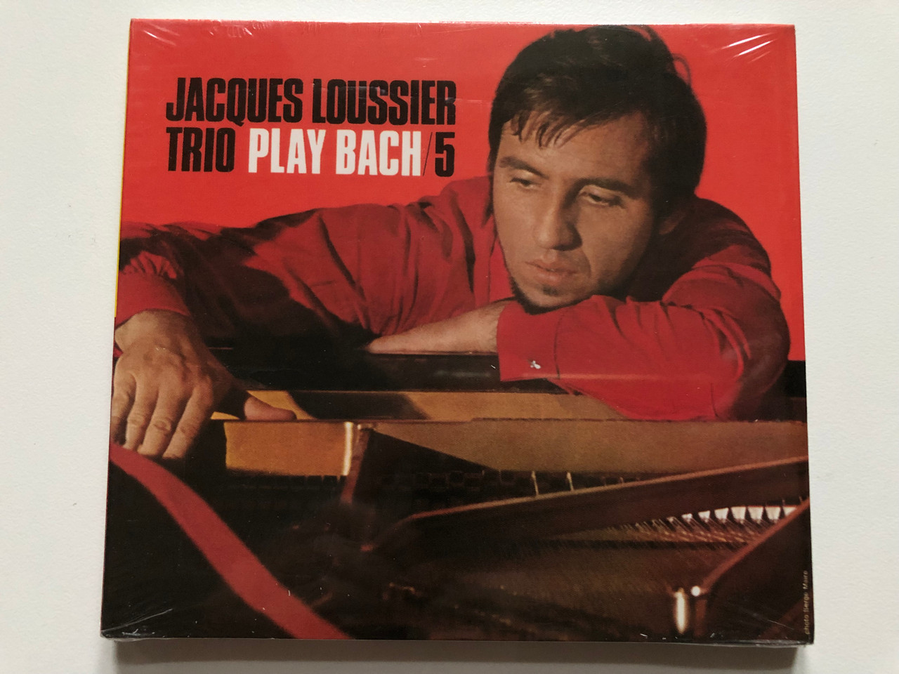 https://cdn10.bigcommerce.com/s-62bdpkt7pb/products/0/images/228080/Jacques_Loussier_Play_Bach_N5_Decca_Audio_CD_159_194-2_1__94874.1652961912.1280.1280.JPG?c=2&_gl=1*bi9egq*_ga*MjA2NTIxMjE2MC4xNTkwNTEyNTMy*_ga_WS2VZYPC6G*MTY1Mjk2MDk4Ni40MDQuMS4xNjUyOTYxNzYzLjU4