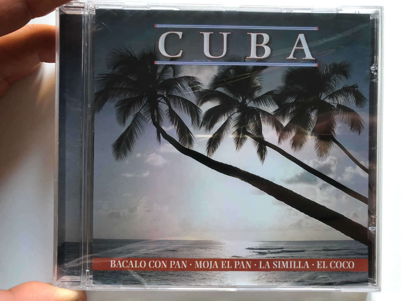 https://cdn10.bigcommerce.com/s-62bdpkt7pb/products/0/images/228109/Cuba_Bacalo_Con_Pan_Moja_El_Pan_La_Similla_El_Coco_ACD_Audio_CD_CD_154_1__09702.1652965334.1280.1280.JPG?c=2&_gl=1*1mtmvaa*_ga*MjA2NTIxMjE2MC4xNTkwNTEyNTMy*_ga_WS2VZYPC6G*MTY1Mjk2MDk4Ni40MDQuMS4xNjUyOTY1MjE0LjMx