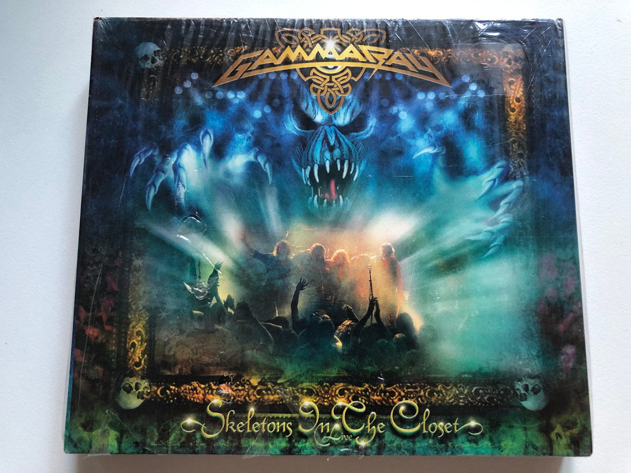 https://cdn10.bigcommerce.com/s-62bdpkt7pb/products/0/images/228136/Gamma_Ray_Skeletons_In_The_Closet_Metal-Is_Records_2x_Audio_CD_2003_MISDL023_1__06738.1652972540.1280.1280.JPG?c=2&_gl=1*71ysol*_ga*MjA2NTIxMjE2MC4xNTkwNTEyNTMy*_ga_WS2VZYPC6G*MTY1Mjk2MDk4Ni40MDQuMS4xNjUyOTcyMDkxLjM3