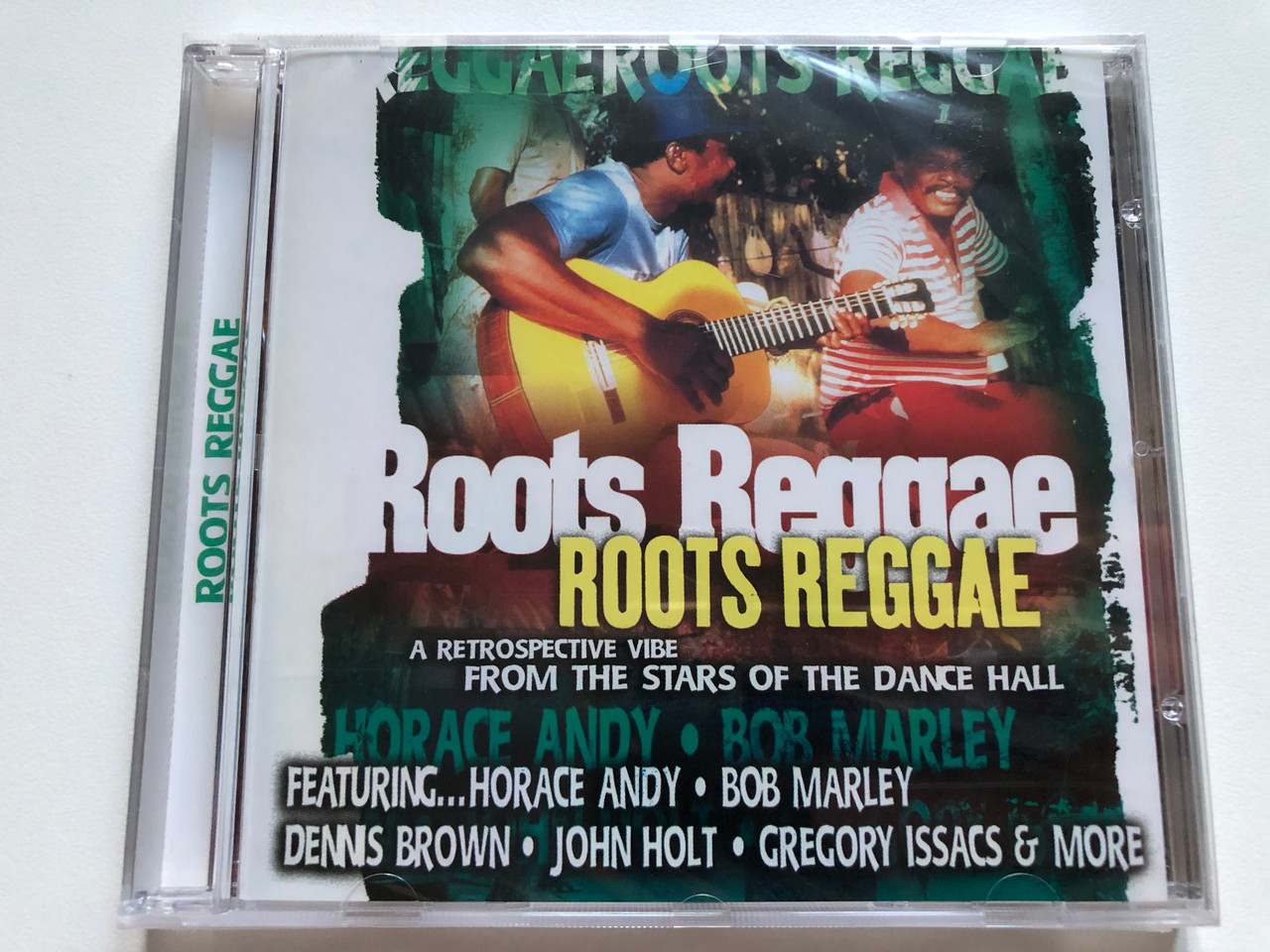 https://cdn10.bigcommerce.com/s-62bdpkt7pb/products/0/images/228138/Roots_Reggae_A_Retrospectiva_vibe_from_the_Stars_of_the_Dance_Hall_Featuring_Horace_Andy_Bob_Marley_Dennis_Brown_John_Holt_Gregory_Isaacs_more_Cedar_Audio_CD_GFS557_1__96866.1652973088.1280.1280.JPG?c=2&_gl=1*1lwvoj9*_ga*MjA2NTIxMjE2MC4xNTkwNTEyNTMy*_ga_WS2VZYPC6G*MTY1Mjk2MDk4Ni40MDQuMS4xNjUyOTcyNjgwLjI2