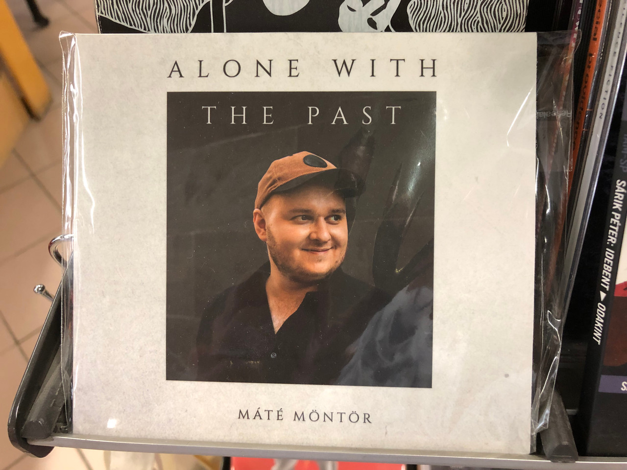 https://cdn10.bigcommerce.com/s-62bdpkt7pb/products/0/images/228230/Alone_With_The_Past_-_Mate_Montor_Pannonia_Studio_Audio_CD_2020_4230768307455_1__52517.1653059191.1280.1280.JPG?c=2&_gl=1*k57o2d*_ga*MjA2NTIxMjE2MC4xNTkwNTEyNTMy*_ga_WS2VZYPC6G*MTY1MzA1NDg0MC40MDUuMS4xNjUzMDU4OTg3LjU2