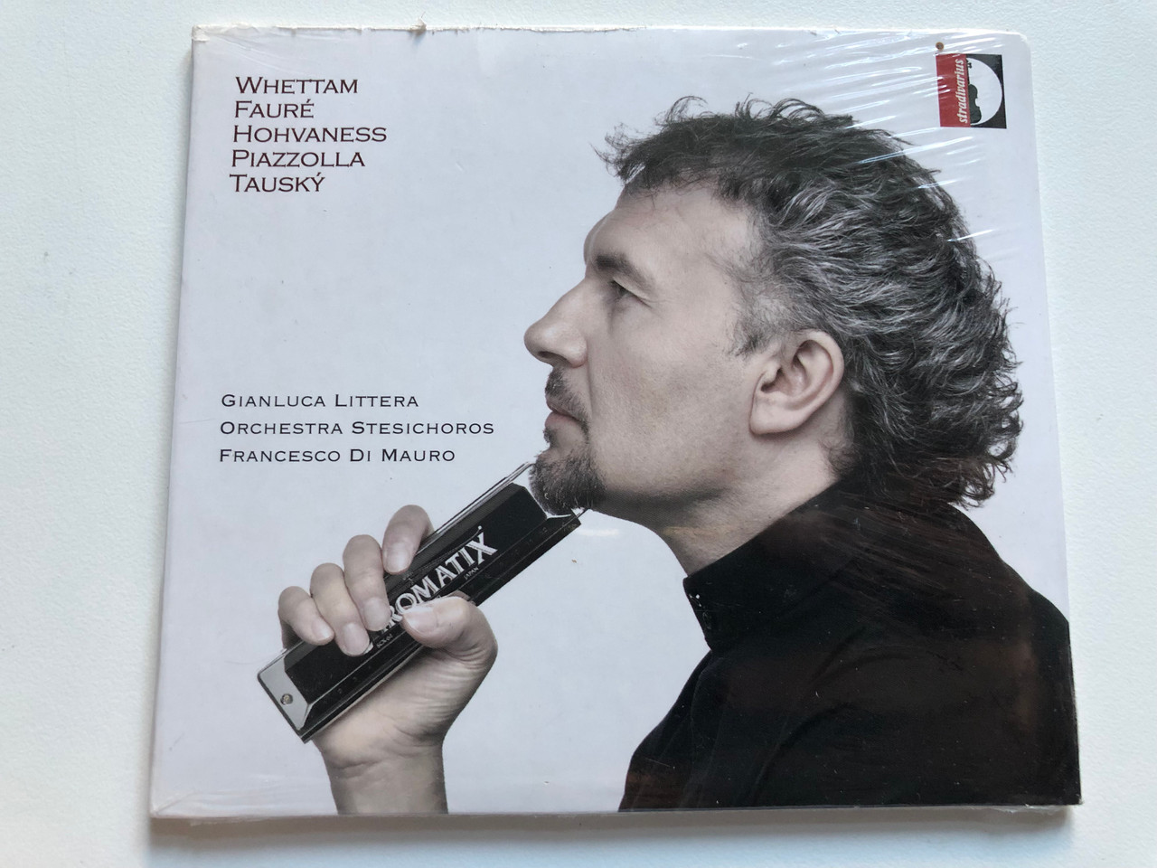 https://cdn10.bigcommerce.com/s-62bdpkt7pb/products/0/images/228314/Whettam_Faur_Hovhaness_Piazzolla_Tausky_Concert_For_Harmonica_Orchestra_Gianluca_Littera_Orchestra_Stesichoros_Francesco_Di_Mauro_Stradivarius_Audio_CD_STR_33875_1__68178.1653275771.1280.1280.JPG?c=2&_gl=1*1nmzhwd*_ga*MjA2NTIxMjE2MC4xNTkwNTEyNTMy*_ga_WS2VZYPC6G*MTY1MzI3NTQzOS40MDYuMC4xNjUzMjc1NDM5LjYw