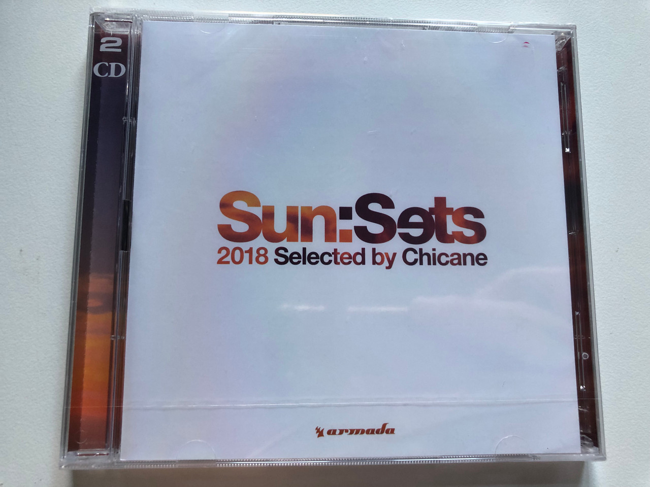 https://cdn10.bigcommerce.com/s-62bdpkt7pb/products/0/images/228326/SunSets_2018_-_Selected_By_Chicane_Sony_Music_2x_Audio_CD_2018_88985496892_1__91465.1653277785.1280.1280.JPG?c=2&_gl=1*14l08h2*_ga*MjA2NTIxMjE2MC4xNTkwNTEyNTMy*_ga_WS2VZYPC6G*MTY1MzI3NTQzOS40MDYuMS4xNjUzMjc3NjQ0LjE.