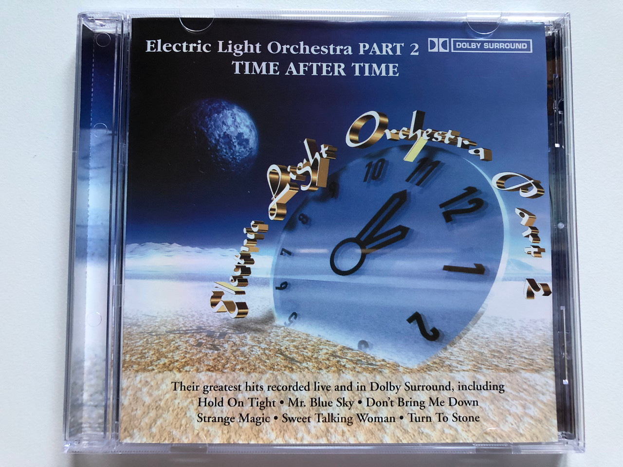 https://cdn10.bigcommerce.com/s-62bdpkt7pb/products/0/images/228495/Electric_Light_Orchestra_Part_2_Time_After_Time_Their_greatest_hits_recorded_live_and_in_Dolby_Surround_including_Hold_On_Tight_Mr._Blue_Sky_Dont_Bring_Me_Down_Strange_Magic_Going_Fo_1__68854.1653372603.1280.1280.JPG?c=2&_gl=1*18e7zzr*_ga*MjA2NTIxMjE2MC4xNTkwNTEyNTMy*_ga_WS2VZYPC6G*MTY1MzM3MTM3Ni40MDguMS4xNjUzMzcyMjEyLjM4