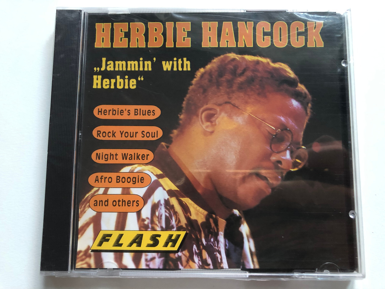 https://cdn10.bigcommerce.com/s-62bdpkt7pb/products/0/images/228545/Herbie_Hancock_Jammin_With_Herbie_Herbies_Blues_Rock_Your_Soul_Night_Walker_Afro_Boogie_and_others_Flash_Audio_CD_8346-2_1__98290.1653382634.1280.1280.JPG?c=2&_gl=1*1pdsui8*_ga*MjA2NTIxMjE2MC4xNTkwNTEyNTMy*_ga_WS2VZYPC6G*MTY1MzM3MTM3Ni40MDguMS4xNjUzMzgyMjM1LjE4