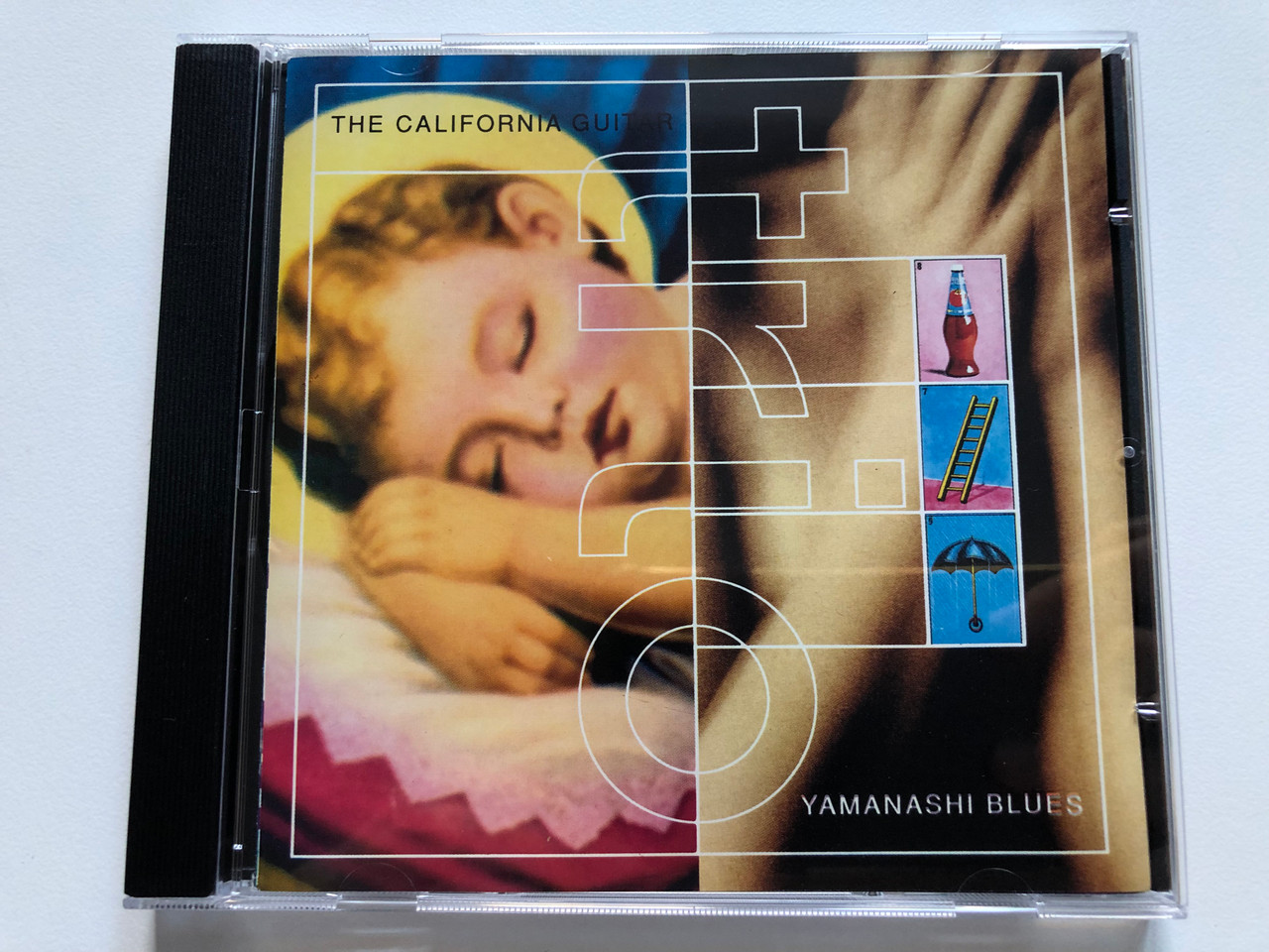 https://cdn10.bigcommerce.com/s-62bdpkt7pb/products/0/images/228670/The_California_Guitar_Trio_Yamanashi_Blues_Discipline_Global_Mobile_Audio_CD_DGM_9301_1__61121.1653462032.1280.1280.JPG?c=2&_gl=1*e9kzc8*_ga*MjA2NTIxMjE2MC4xNTkwNTEyNTMy*_ga_WS2VZYPC6G*MTY1MzQ1MjE0OC40MDkuMS4xNjUzNDYxNjc2LjM4