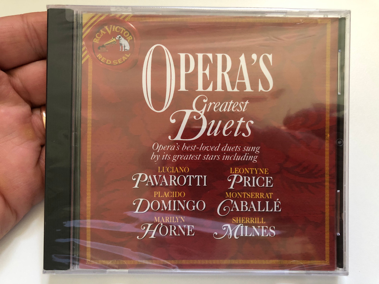 https://cdn10.bigcommerce.com/s-62bdpkt7pb/products/0/images/228823/Operas_Greatest_Duets_-_Operas_best-loved_duets_sung_by_its_greatest_stars_including_Luciano_Pavarotti_Leontyne_Price_Placido_Domingo_Montserrat_Caball_Marilyn_Horne_Sherrill_Milnes_1__25044.1653538903.1280.1280.JPG?c=2&_gl=1*i7li6g*_ga*MjA2NTIxMjE2MC4xNTkwNTEyNTMy*_ga_WS2VZYPC6G*MTY1MzUzODI3Ny40MTAuMS4xNjUzNTM4NjU5LjI3