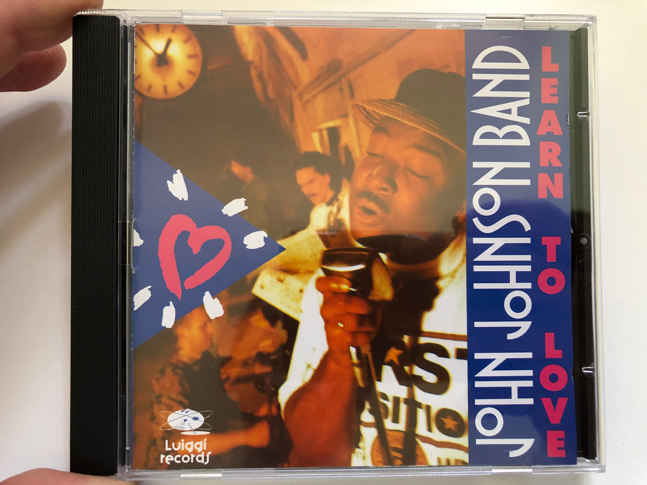 https://cdn10.bigcommerce.com/s-62bdpkt7pb/products/0/images/228875/John_Johnson_Band_Learn_To_Love_Luiggi_Records_Audio_CD_1995_LR-11472_1__94634.1653544540.1280.1280.JPG?c=2&_gl=1*r5fhkf*_ga*MjA2NTIxMjE2MC4xNTkwNTEyNTMy*_ga_WS2VZYPC6G*MTY1MzUzODI3Ny40MTAuMS4xNjUzNTQ0NDUxLjQ4