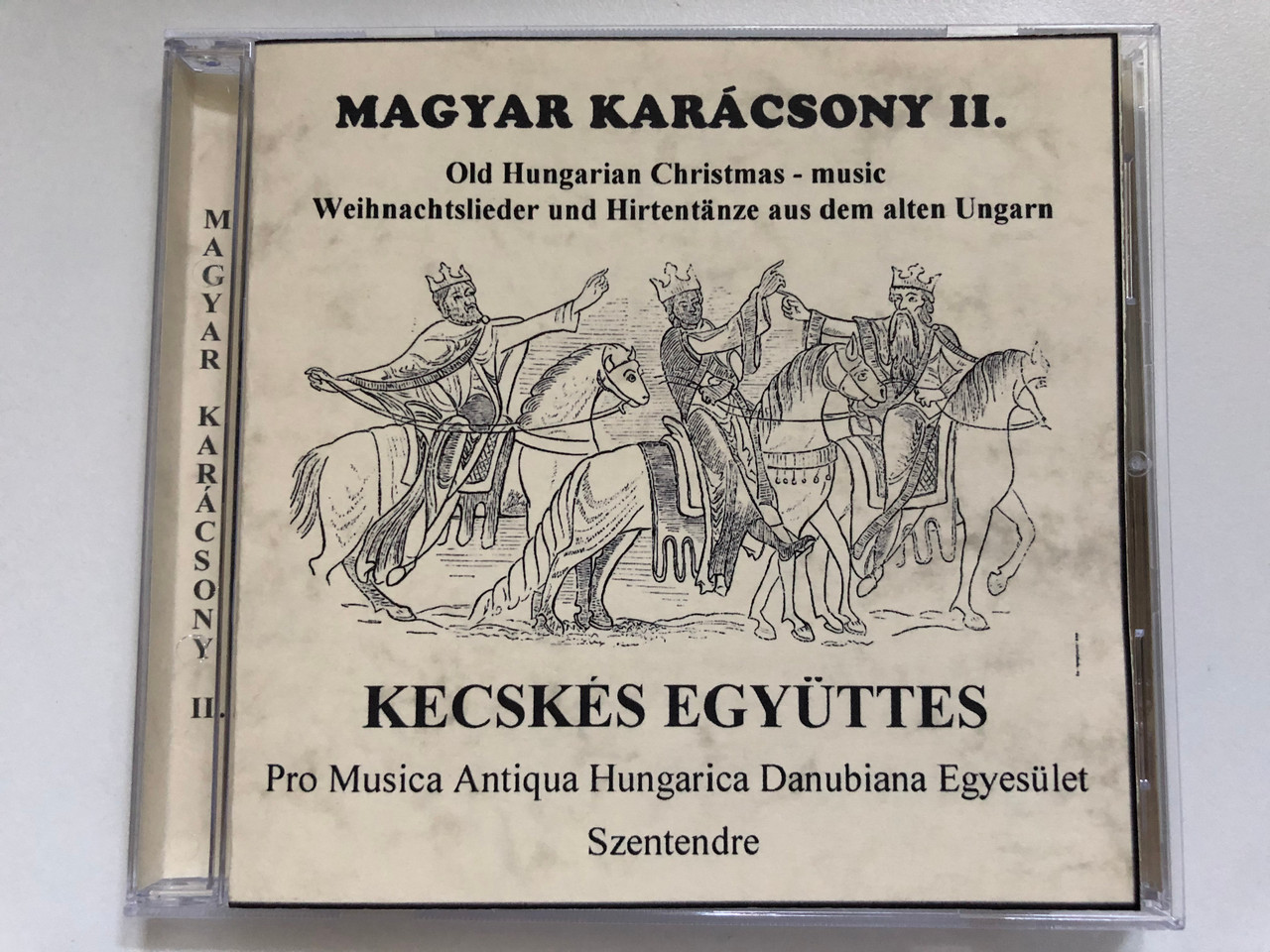 https://cdn10.bigcommerce.com/s-62bdpkt7pb/products/0/images/228894/Magyar_Karcsony_II._Old_Hungarian_Christmas-Music_Weihnachtslieder_Und_Hirtentnze_Aud_Dem_Alten_Ungarn_Kecskes_Egyuttes_-_Pro_Musica_Antiqua_Hungarica_Danubiana_Egyesulet_Szentendre_1__87519.1653545647.1280.1280.JPG?c=2&_gl=1*1666cia*_ga*MjA2NTIxMjE2MC4xNTkwNTEyNTMy*_ga_WS2VZYPC6G*MTY1MzUzODI3Ny40MTAuMS4xNjUzNTQ1NjI0LjYw