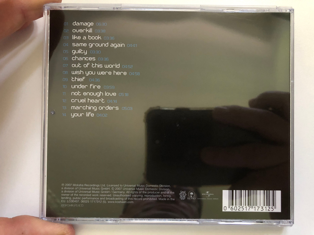 https://cdn10.bigcommerce.com/s-62bdpkt7pb/products/0/images/228912/Kosheen_Damage_Island_Records_Audio_CD_2007_06025_1717312_6__76614.1653560582.1280.1280.JPG?c=2&_gl=1*1912jn4*_ga*MjA2NTIxMjE2MC4xNTkwNTEyNTMy*_ga_WS2VZYPC6G*MTY1MzU1ODk1OC40MTEuMS4xNjUzNTYwNDIzLjM2