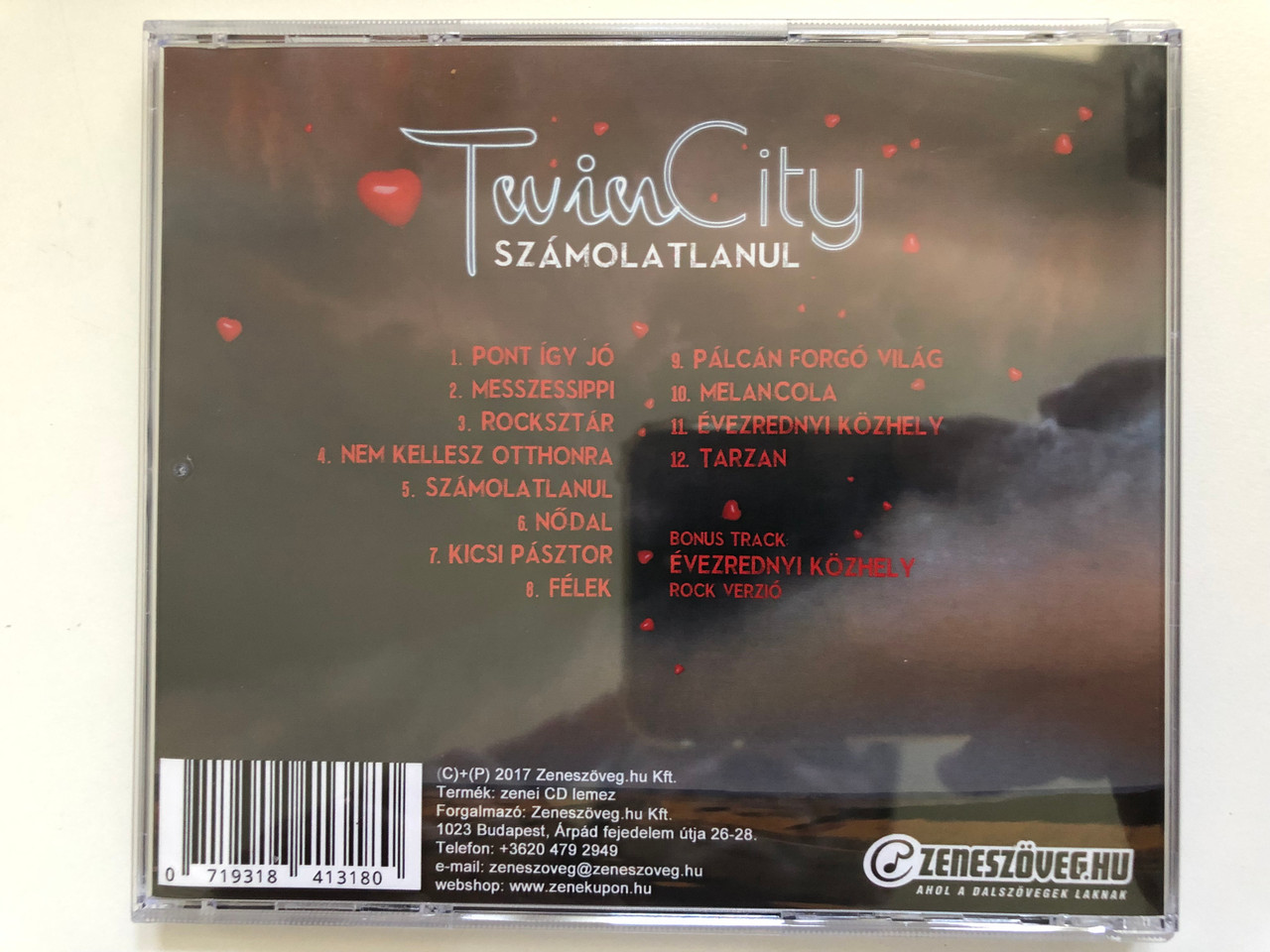 https://cdn10.bigcommerce.com/s-62bdpkt7pb/products/0/images/228917/Twin_City_-_Szamolatlanul_Zeneszoveg_Audio_CD_2017_0719318413180_4__49975.1653561034.1280.1280.JPG?c=2&_gl=1*iigerj*_ga*MjA2NTIxMjE2MC4xNTkwNTEyNTMy*_ga_WS2VZYPC6G*MTY1MzU1ODk1OC40MTEuMS4xNjUzNTYwODk4LjE3