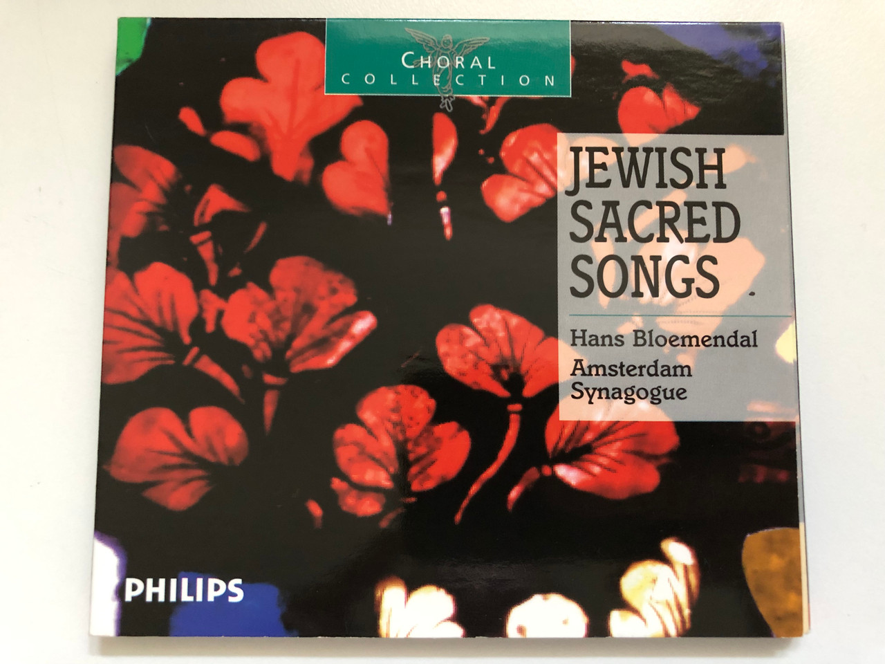https://cdn10.bigcommerce.com/s-62bdpkt7pb/products/0/images/228922/Jewish_Sacred_Songs_-_Hans_Bloemendal_Amsterdam_Synagogue_Choral_Collection_Philips_Classics_Audio_CD_1997_Stereo_462_061-2_1__69058.1653561862.1280.1280.JPG?c=2&_gl=1*vnctsu*_ga*MjA2NTIxMjE2MC4xNTkwNTEyNTMy*_ga_WS2VZYPC6G*MTY1MzU1ODk1OC40MTEuMS4xNjUzNTYxODUzLjYw