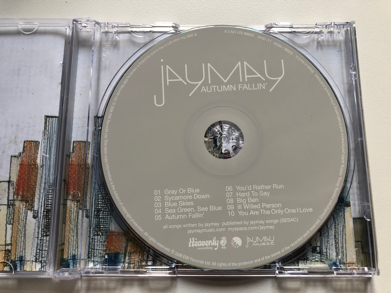 https://cdn10.bigcommerce.com/s-62bdpkt7pb/products/0/images/228946/Jaymay_Autumn_Fallin_Heavenly_Audio_CD_2007_5099952112928_3__46411.1653568643.1280.1280.JPG?c=2&_gl=1*1iu8sp9*_ga*MjA2NTIxMjE2MC4xNTkwNTEyNTMy*_ga_WS2VZYPC6G*MTY1MzU2Njk1Ni40MTIuMS4xNjUzNTY4NTcwLjIw