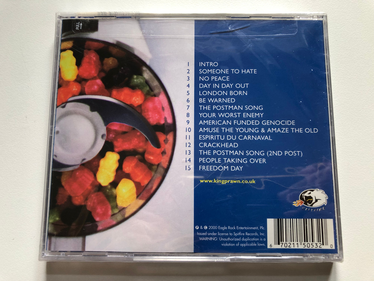 https://cdn10.bigcommerce.com/s-62bdpkt7pb/products/0/images/229173/King_Prawn_Surrender_To_The_Blender_Spitfire_Records_Audio_CD_2000_5053-2_2__80054.1653633126.1280.1280.JPG?c=2&_gl=1*g7r4vl*_ga*MjA2NTIxMjE2MC4xNTkwNTEyNTMy*_ga_WS2VZYPC6G*MTY1MzYyMzY5Mi40MTMuMS4xNjUzNjMyOTM3LjYw