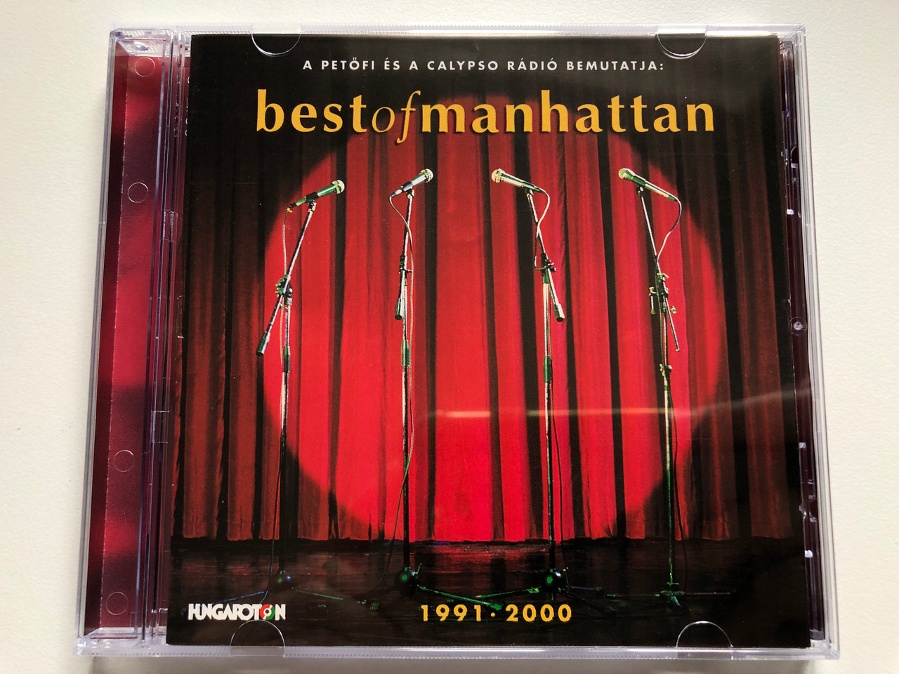 https://cdn10.bigcommerce.com/s-62bdpkt7pb/products/0/images/229207/A_Petofi_Es_A_Calypso_Radio_Bemutatja_Best_Of_Manhattan_1991_-_2000_Hungaroton_Audio_CD_2000_HCD_37985_1__61743.1653634126.1280.1280.JPG?c=2&_gl=1*evaovt*_ga*MjA2NTIxMjE2MC4xNTkwNTEyNTMy*_ga_WS2VZYPC6G*MTY1MzYyMzY5Mi40MTMuMS4xNjUzNjM0MDk1LjYw