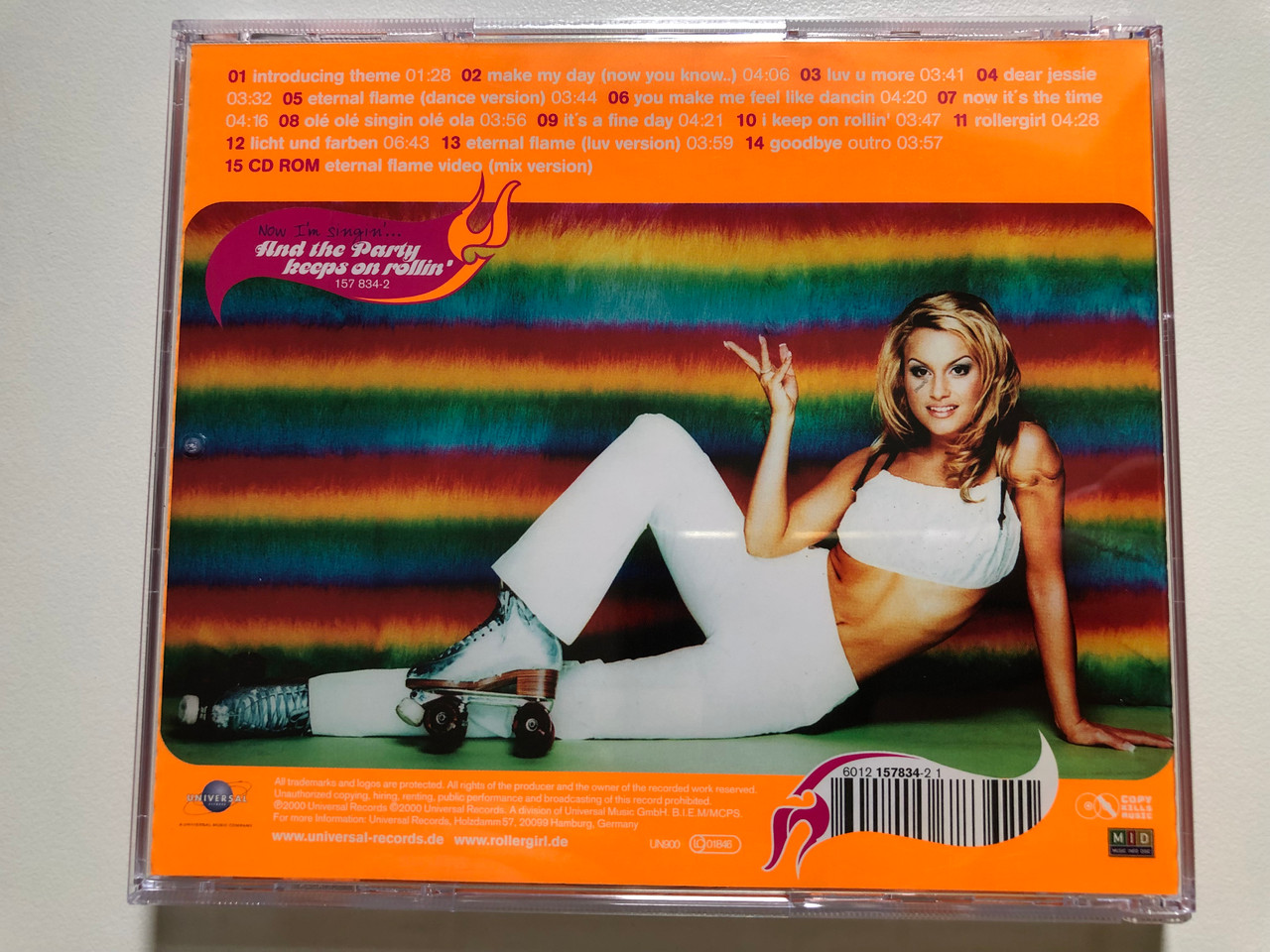 https://cdn10.bigcommerce.com/s-62bdpkt7pb/products/0/images/230354/Rollergirl_Now_Im_Singin..._And_The_Party_Keeps_On_Rollin_Universal_Records_Audio_CD_2000_157_834-2_4__00862.1654006254.1280.1280.JPG?c=2&_gl=1*178q3i0*_ga*MjA2NTIxMjE2MC4xNTkwNTEyNTMy*_ga_WS2VZYPC6G*MTY1NDAwNTAzNy40MTUuMS4xNjU0MDA2MzUzLjYw