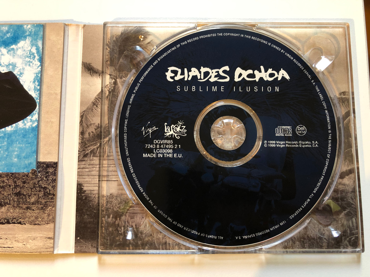 https://cdn10.bigcommerce.com/s-62bdpkt7pb/products/0/images/230708/Eliades_Ochoa_Y_El_Cuarteto_Patria_Sublime_Ilusin_Virgin_Audio_CD_1999_724384749521_3__76293.1654088928.1280.1280.JPG?c=2&_gl=1*2swcjn*_ga*MjA2NTIxMjE2MC4xNTkwNTEyNTMy*_ga_WS2VZYPC6G*MTY1NDA4NjM5NC40MTcuMS4xNjU0MDg4NTIyLjc.